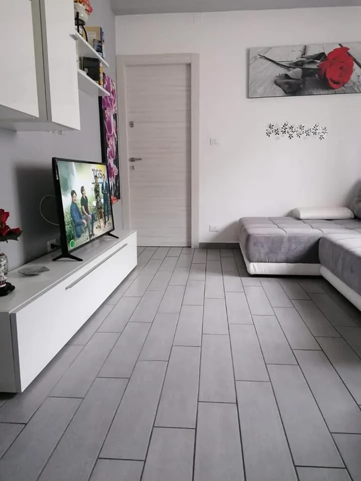 Communal lounge/ TV room, Bed in Casa Normanna