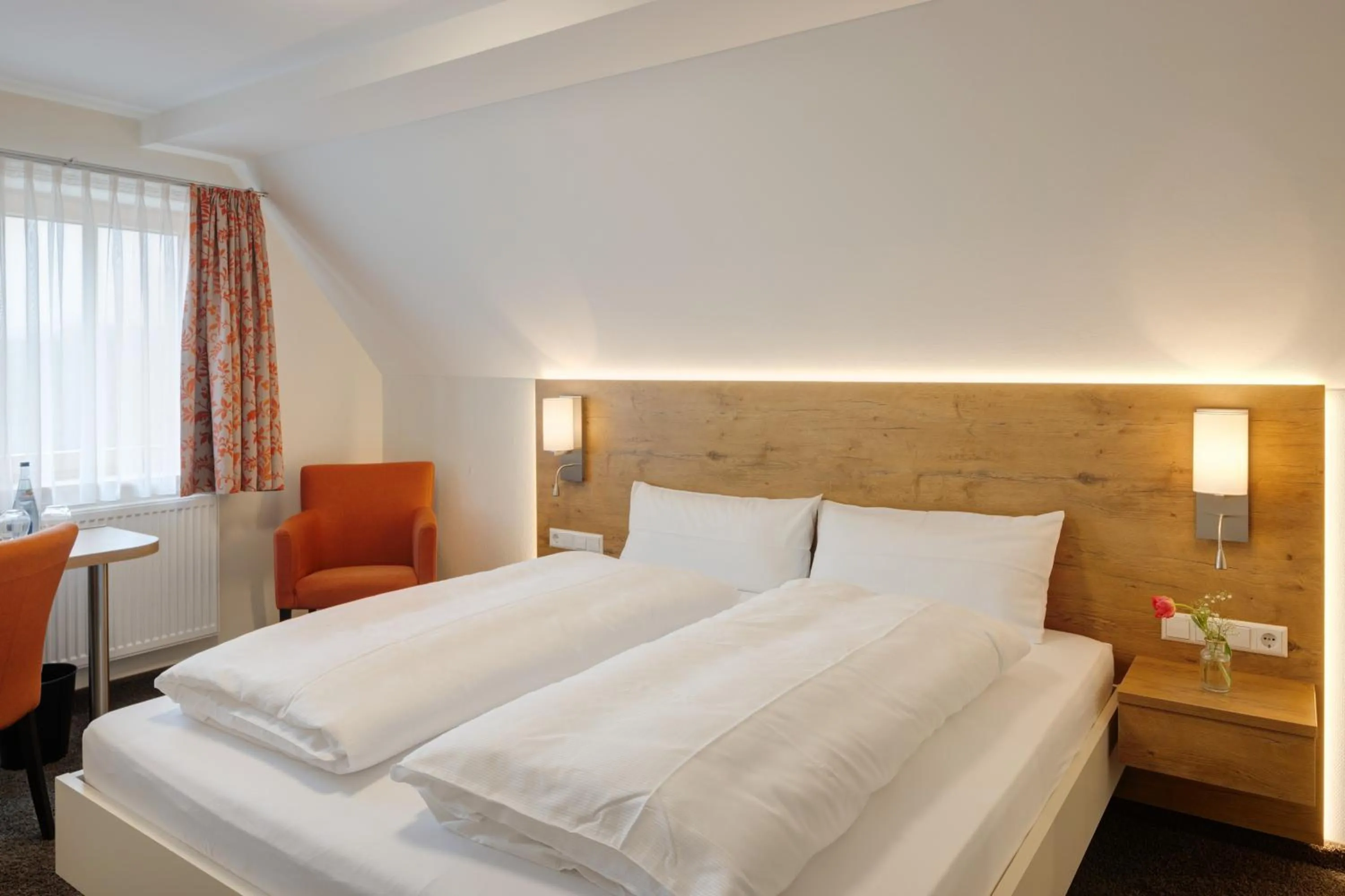 Photo of the whole room, Bed in Landhotel Steigenhaus