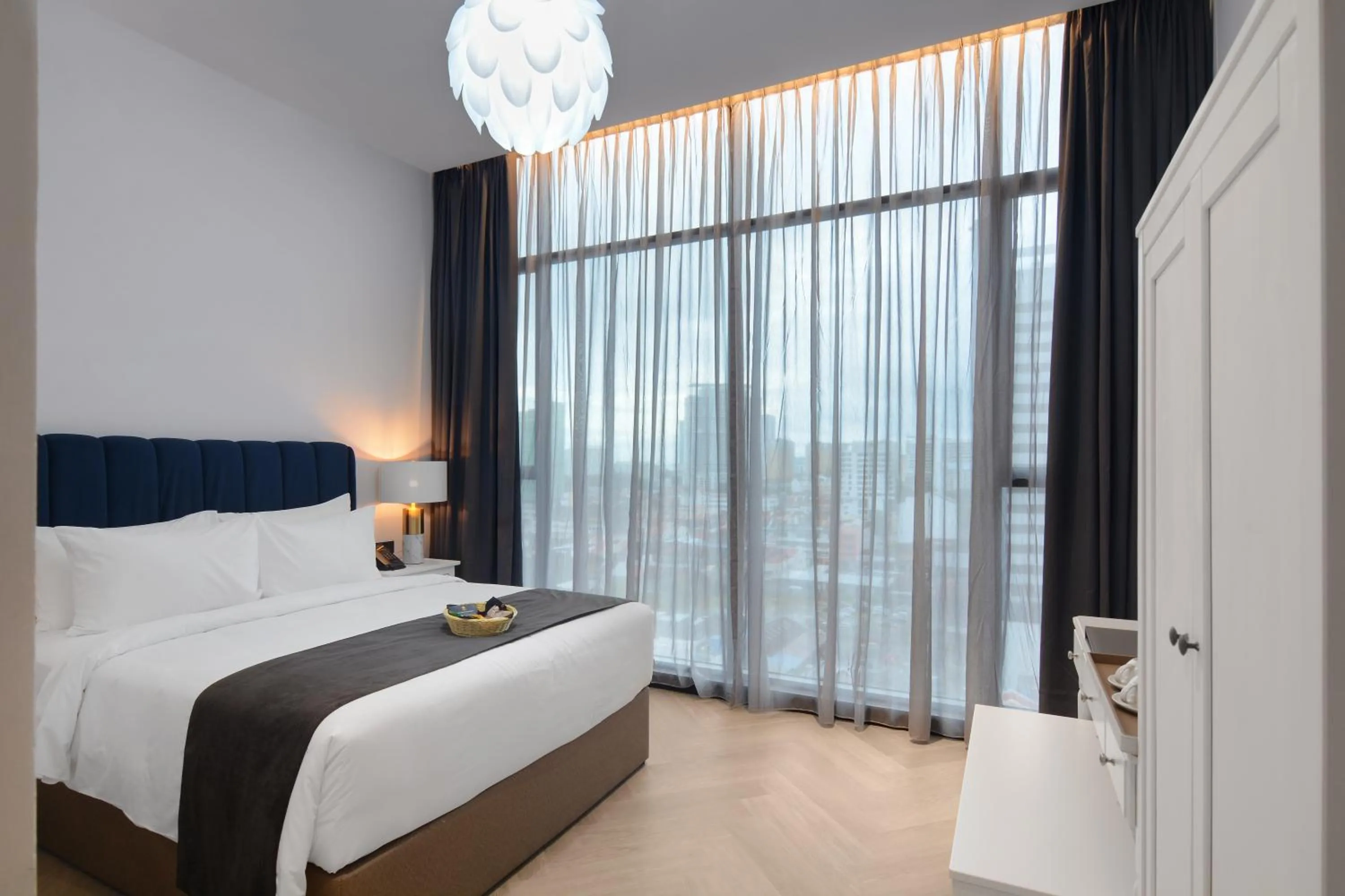 Bed in The Granite Luxury Hotel Penang