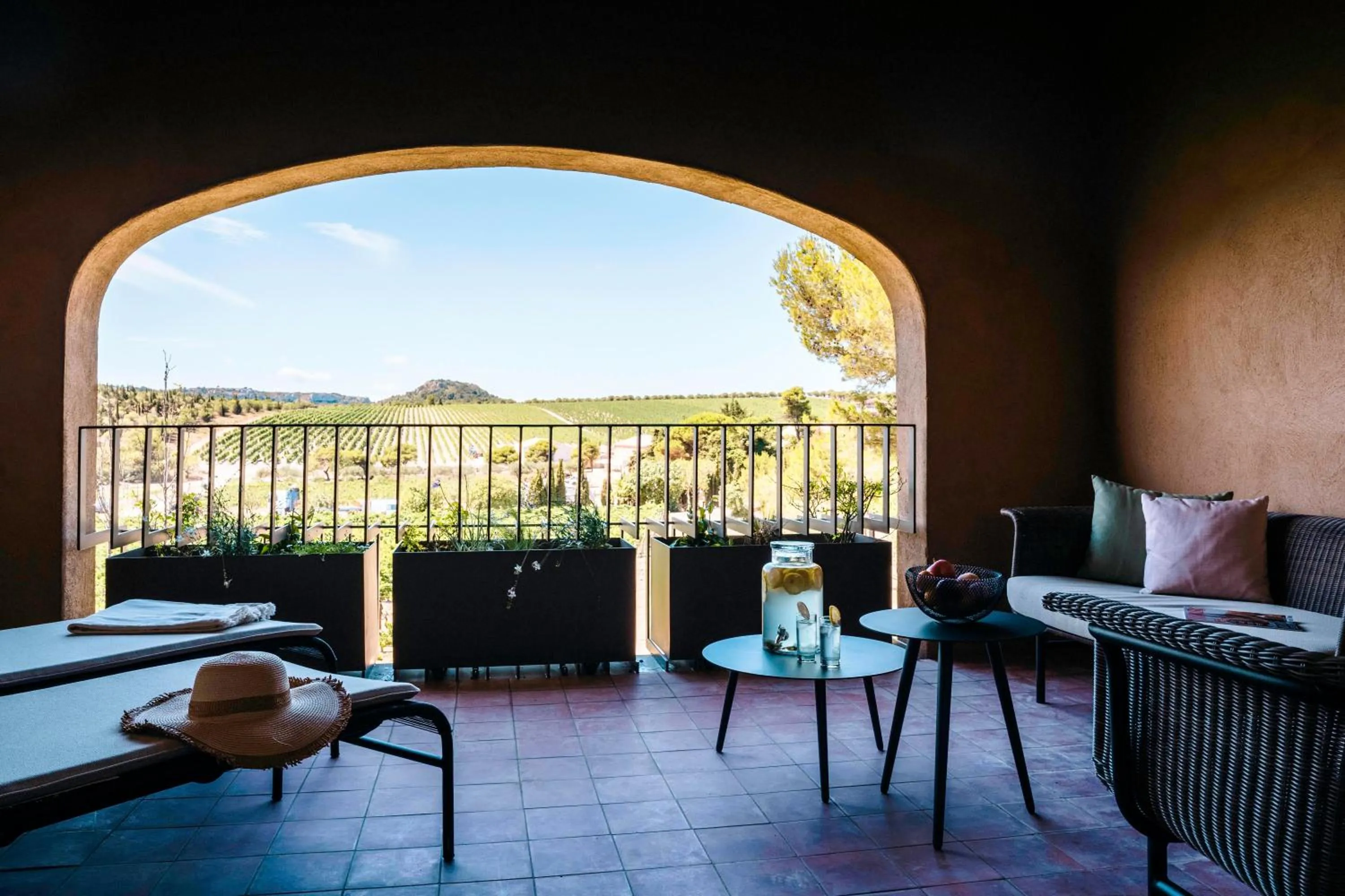 Balcony/Terrace, Bed in Château L'Hospitalet Wine Resort Beach & Spa