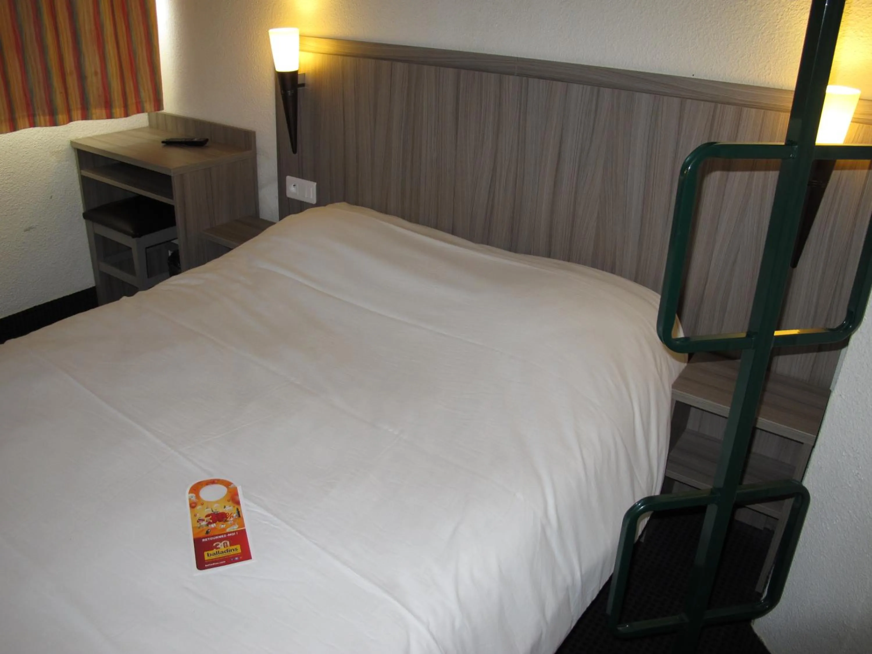 Bed in Initial by Balladins Béthune