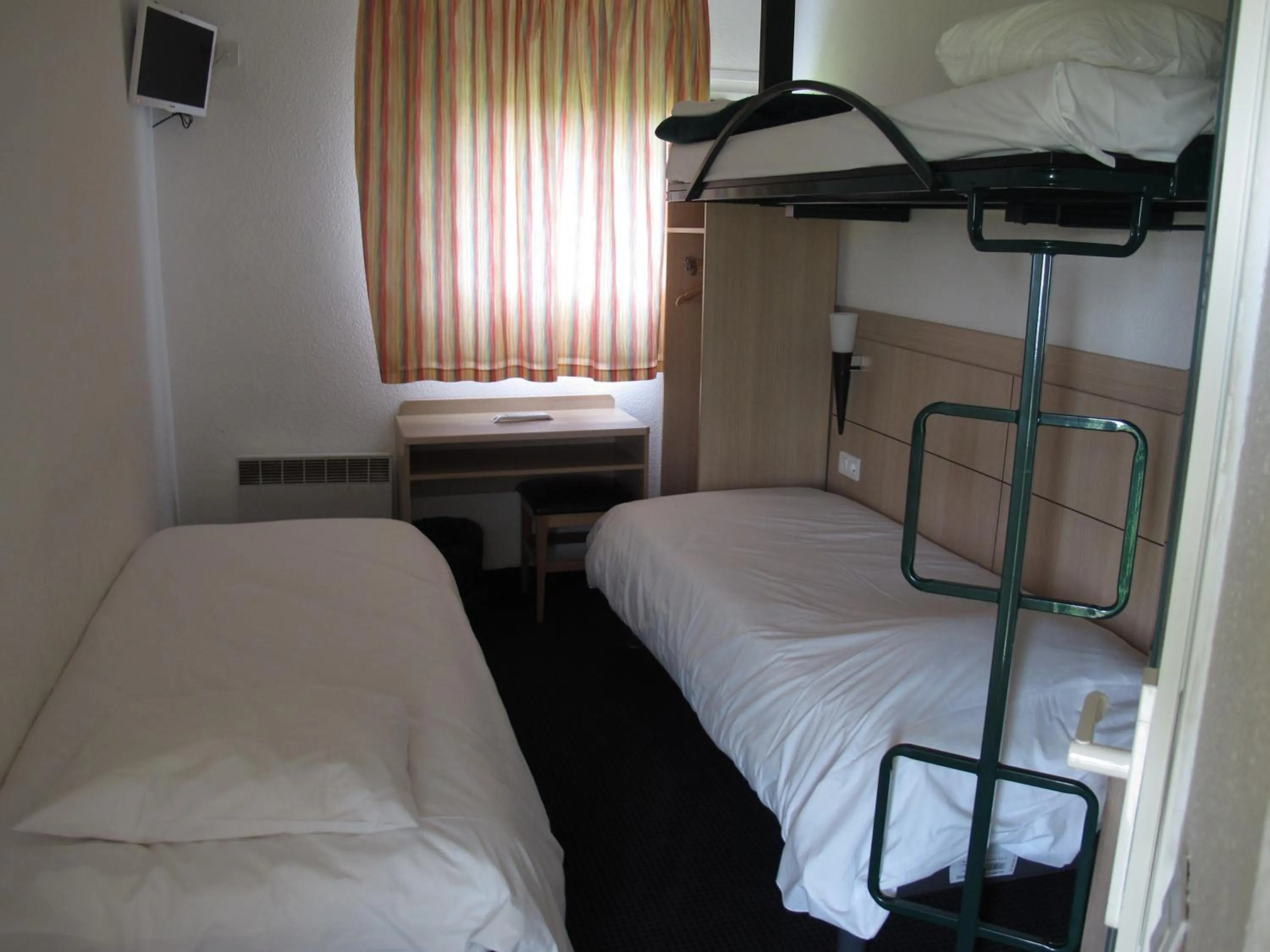 Bed in Initial by Balladins Béthune