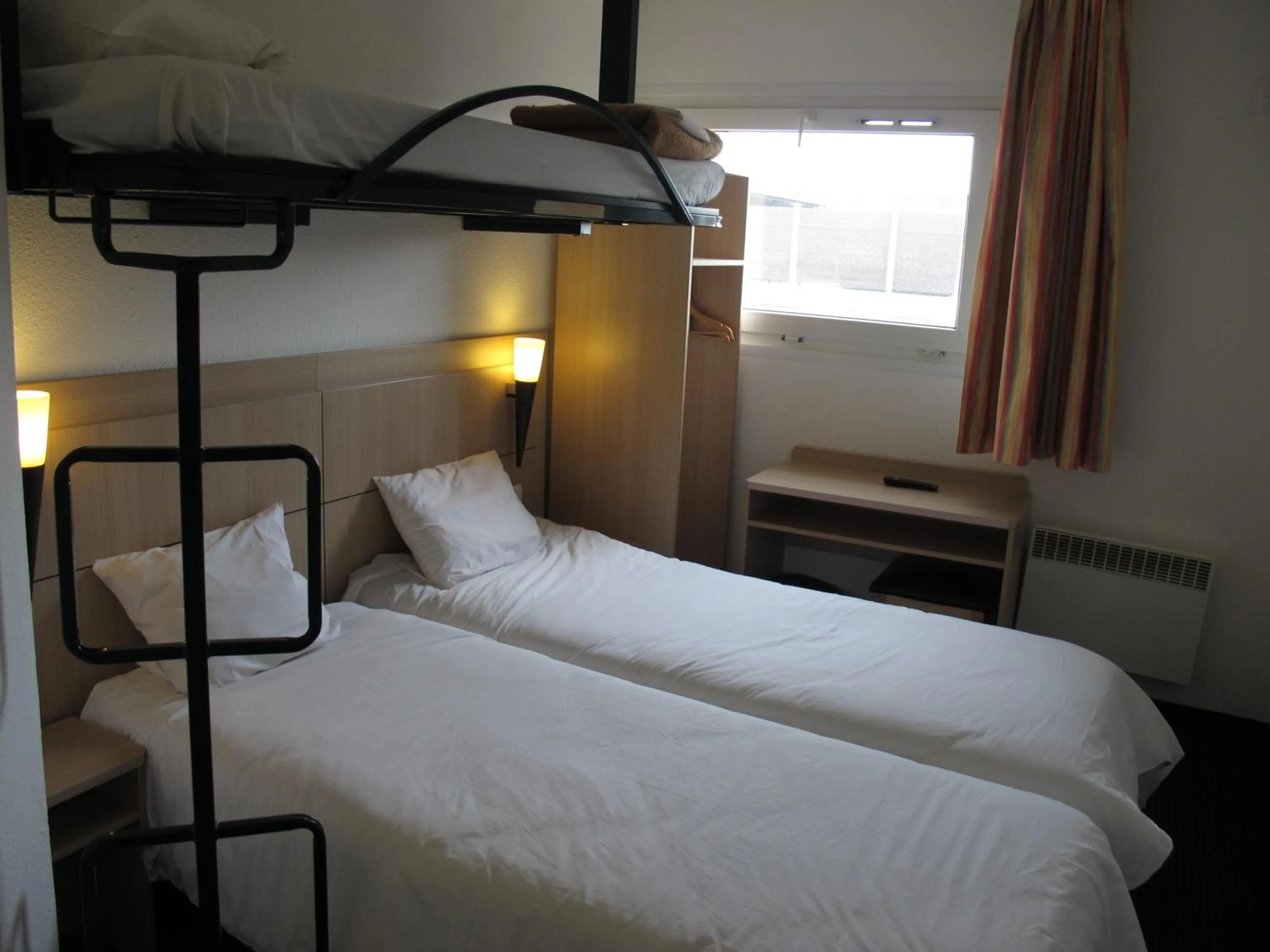 Bed in Initial by Balladins Béthune