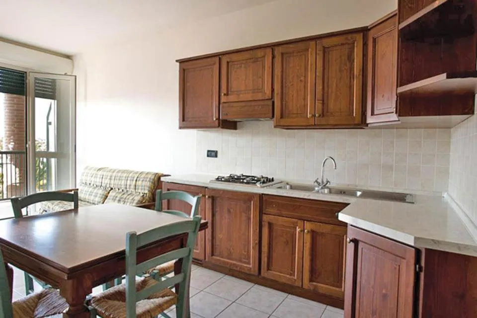 Kitchen or kitchenette in Le Residenze di Santa Costanza - Il Lentisco