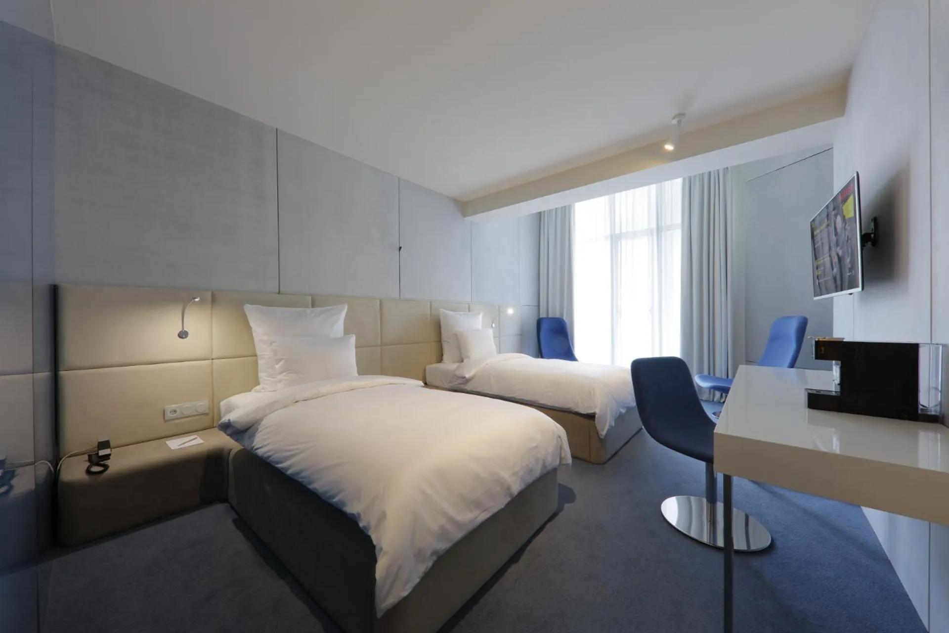 Bed in The Grove Design Hotel