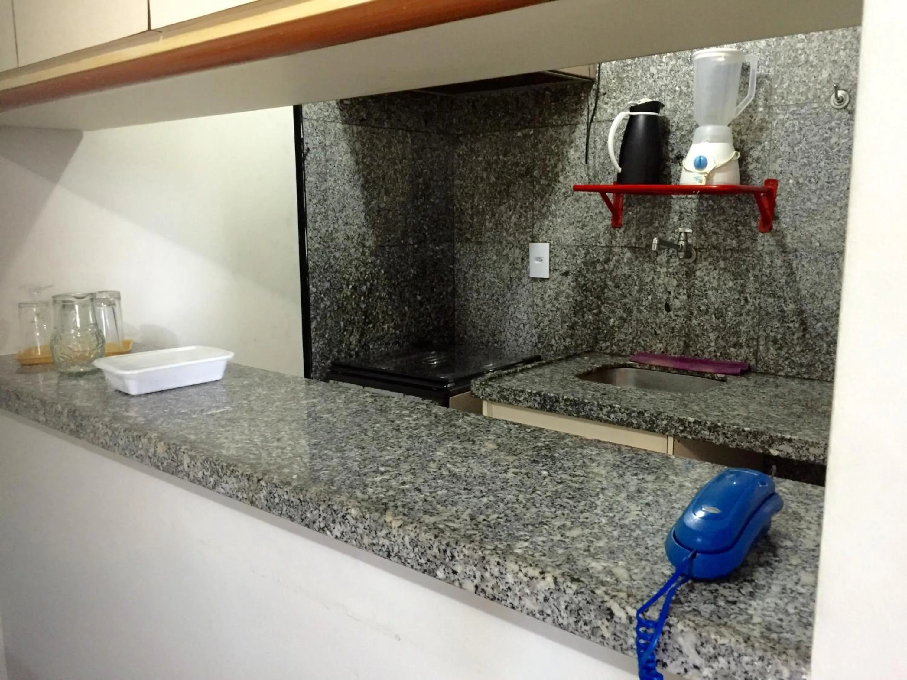 Kitchen or kitchenette in Atlântico Flat Residence