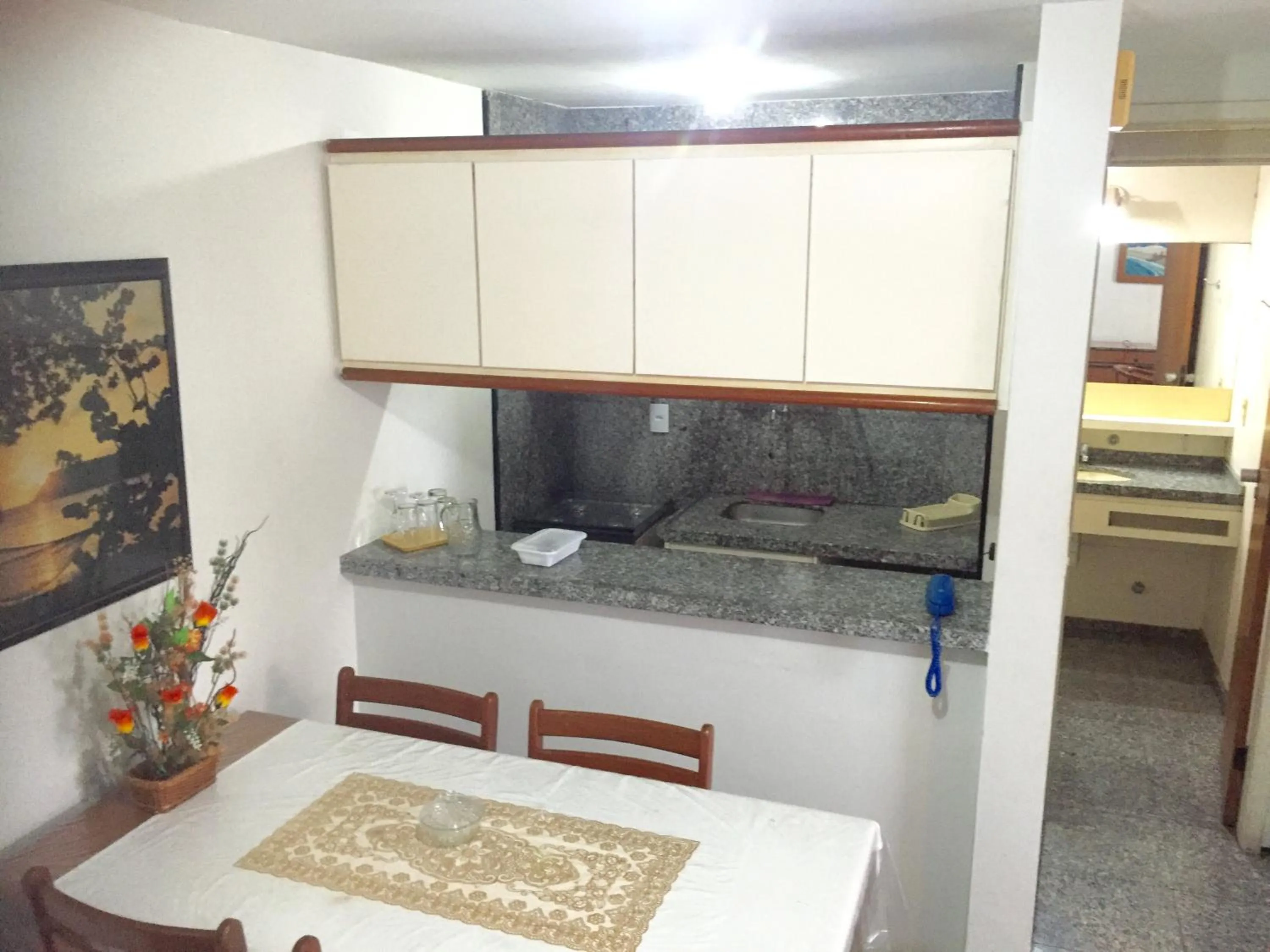 Kitchen or kitchenette in Atlântico Flat Residence