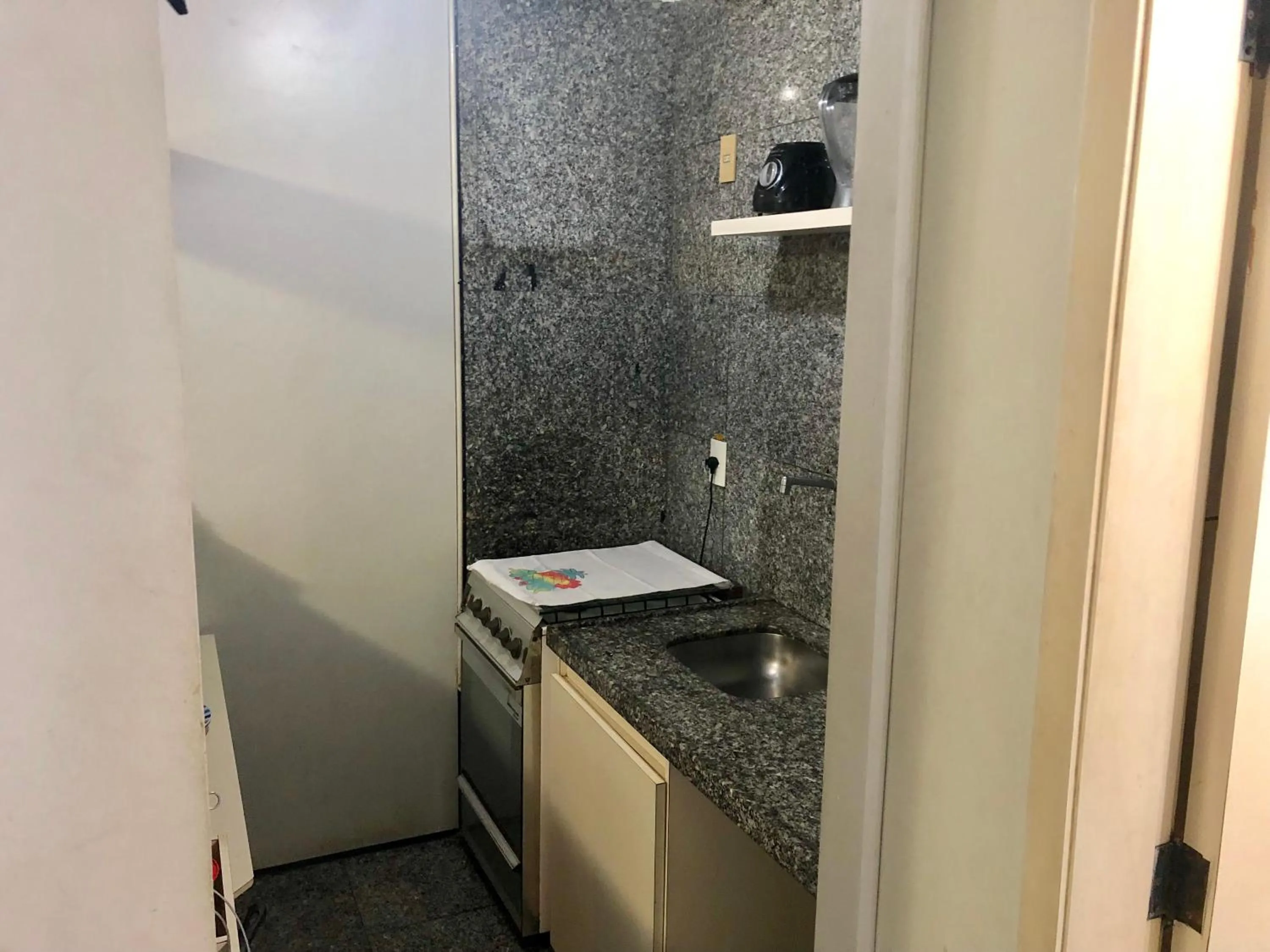 Kitchen or kitchenette in Atlântico Flat Residence