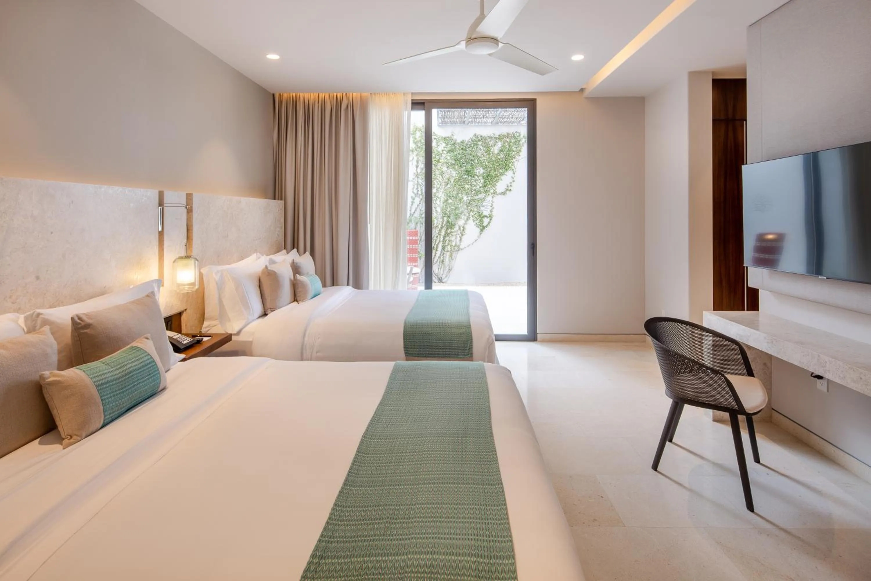 Bed in The Club at Solaz Luxury Villas