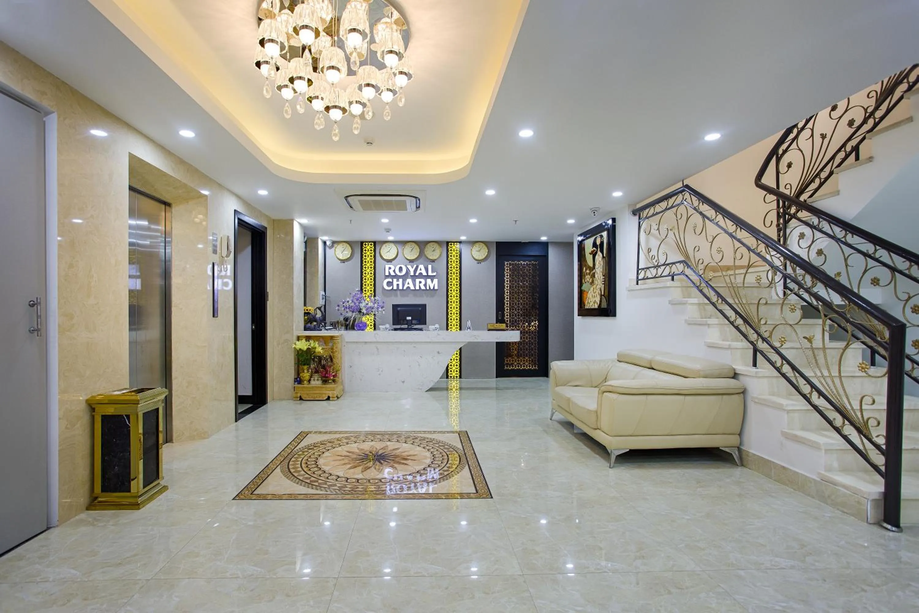 Communal lounge/ TV room in Royal Charm Hotel