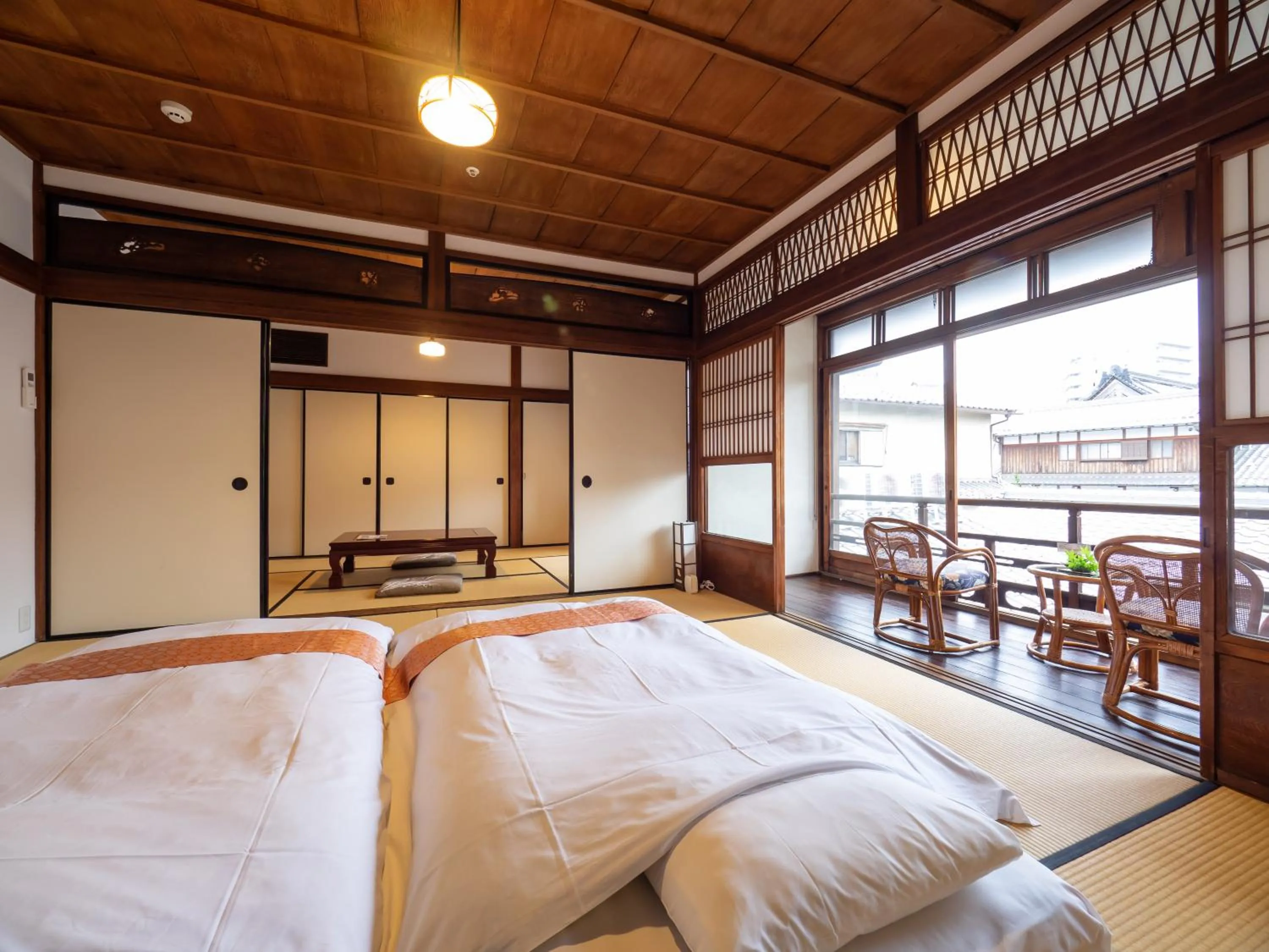 Bed in Inase Otsu Machiya Bed and Breakfast