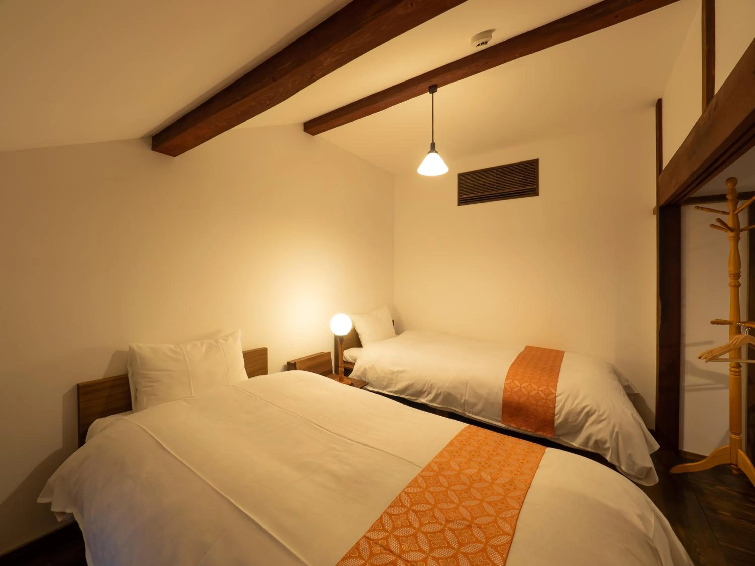 Bed in Inase Otsu Machiya Bed and Breakfast