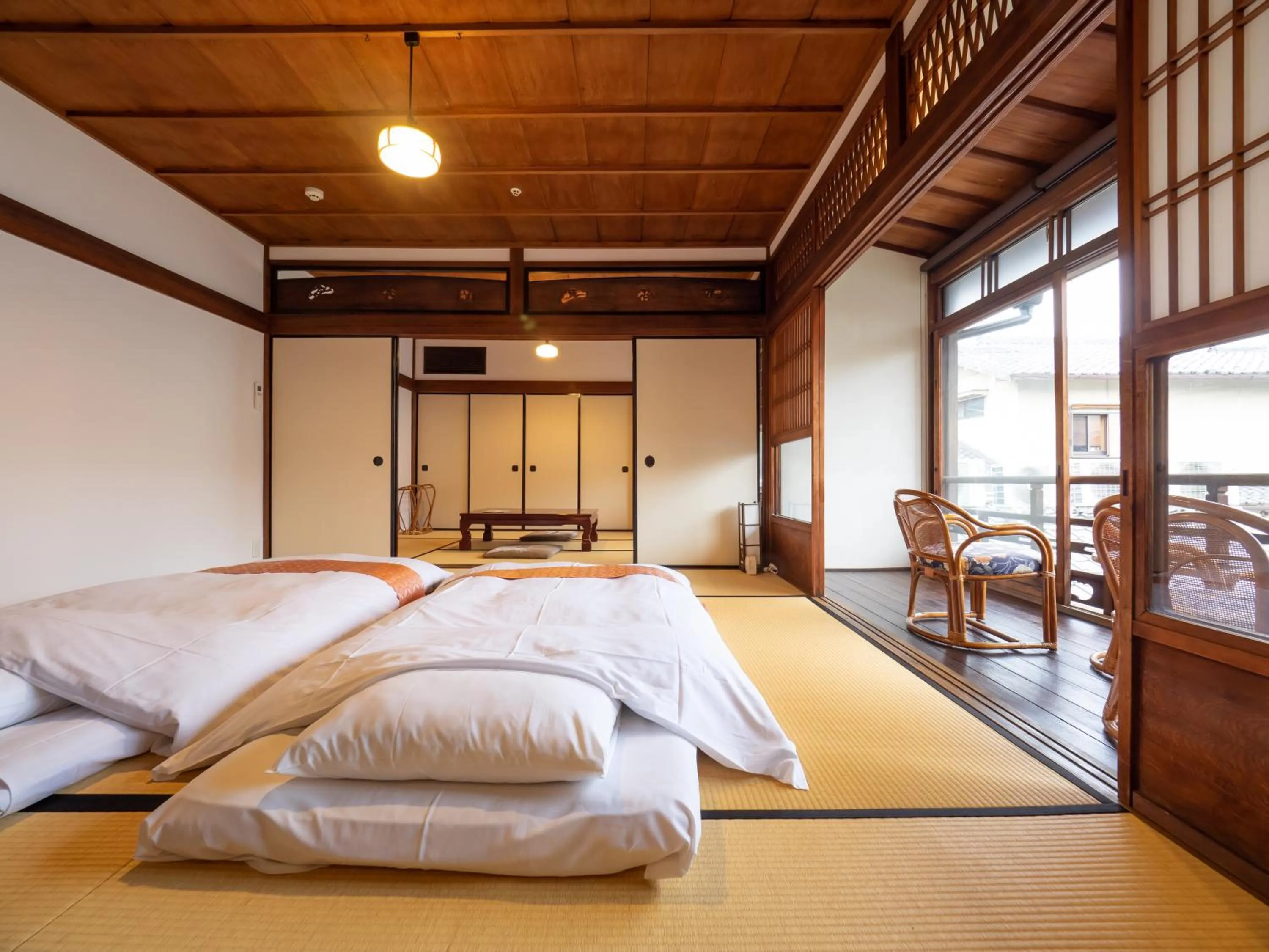 Bed in Inase Otsu Machiya Bed and Breakfast