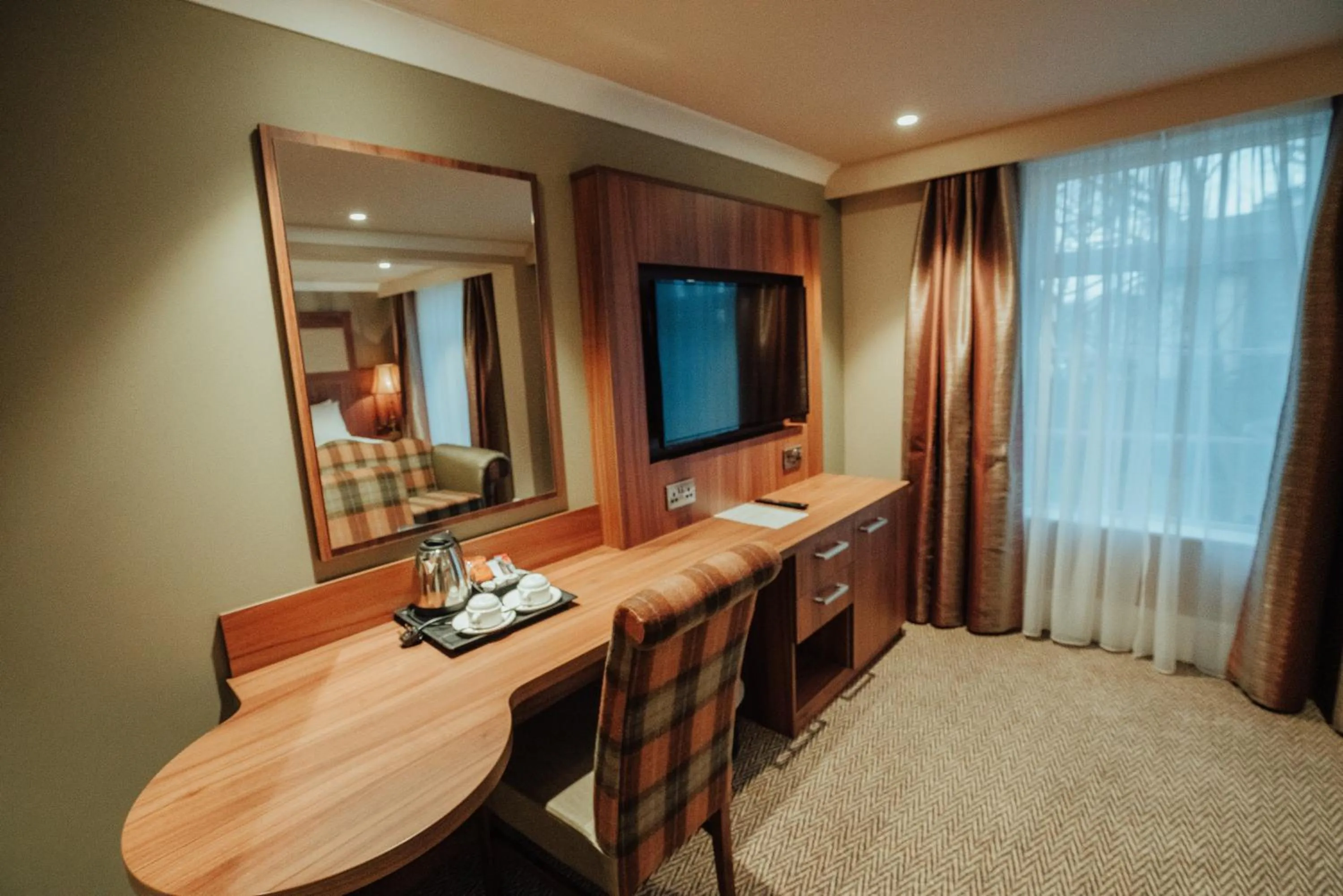 Property building in Dunadry Hotel And Gardens