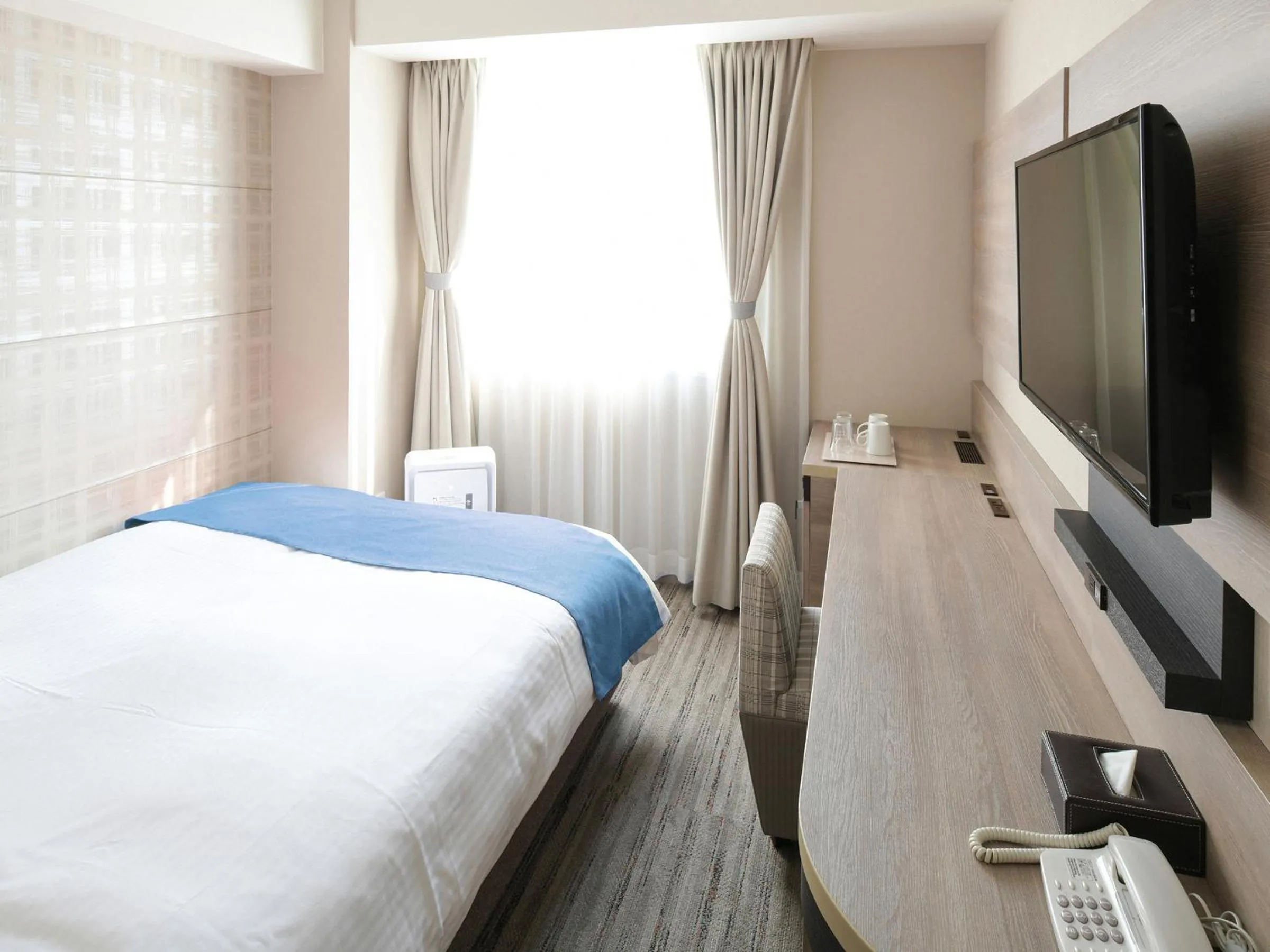 Bed in Vessel Inn Shigamoriyama Station