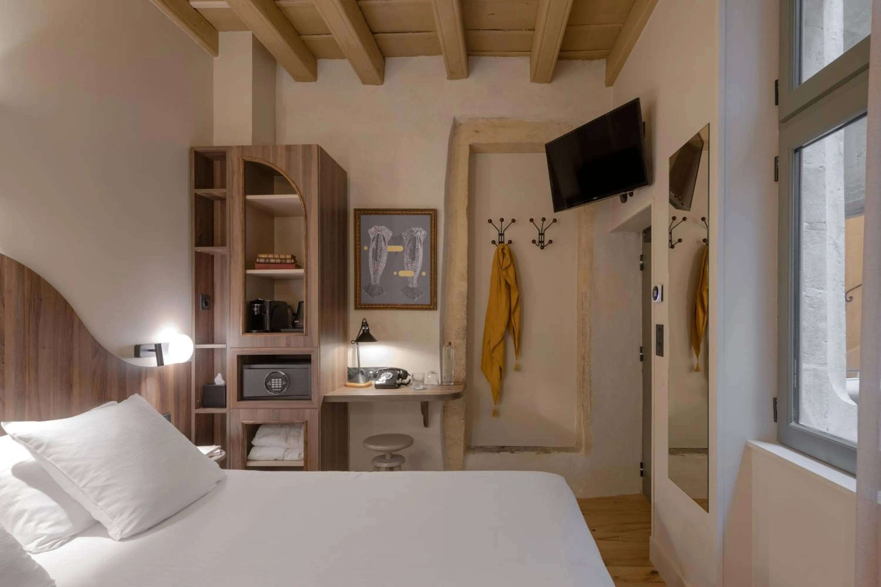 Bed in Académie Hôtel Lyon