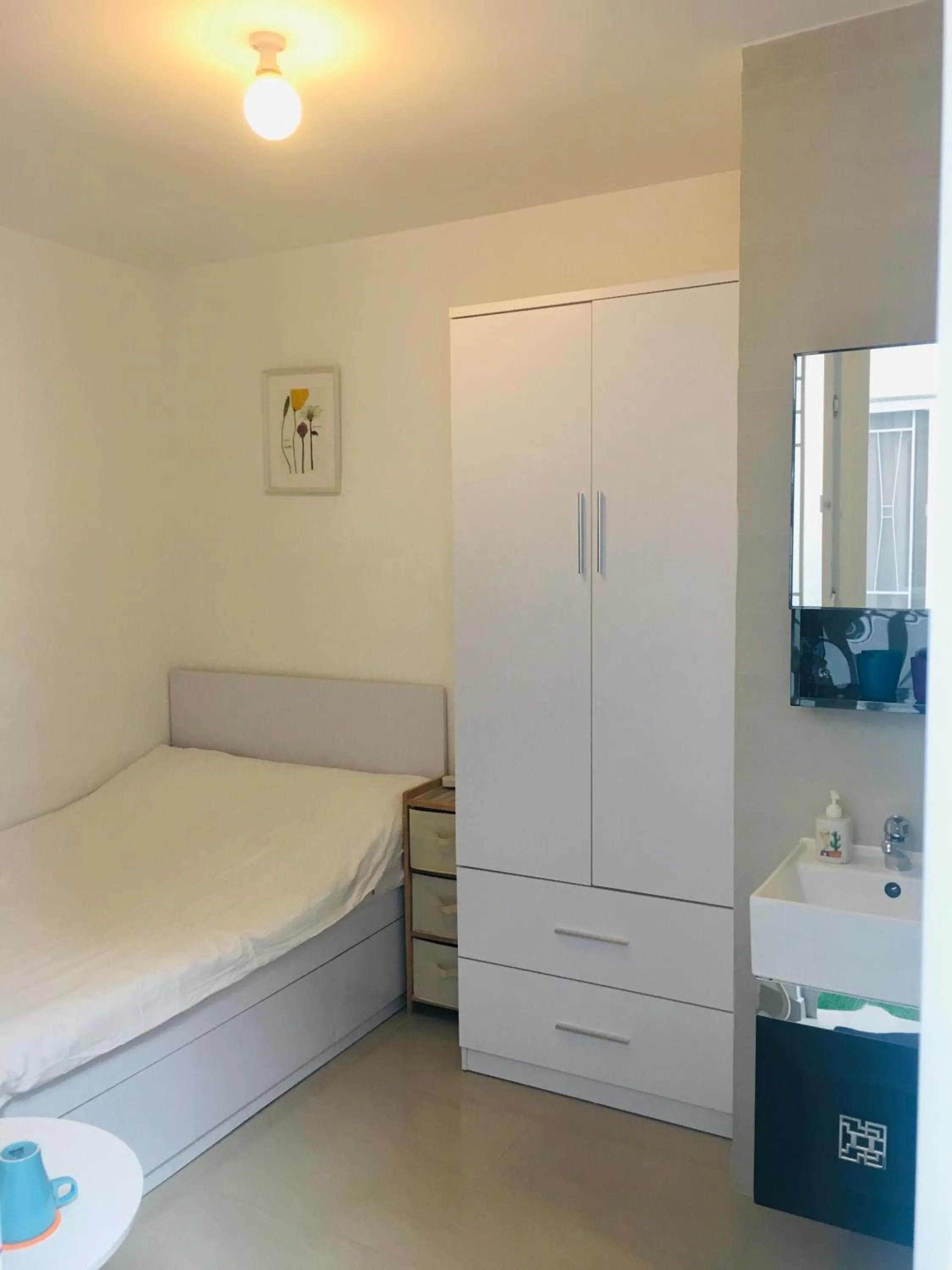 Bed in City Oasis Guesthouse