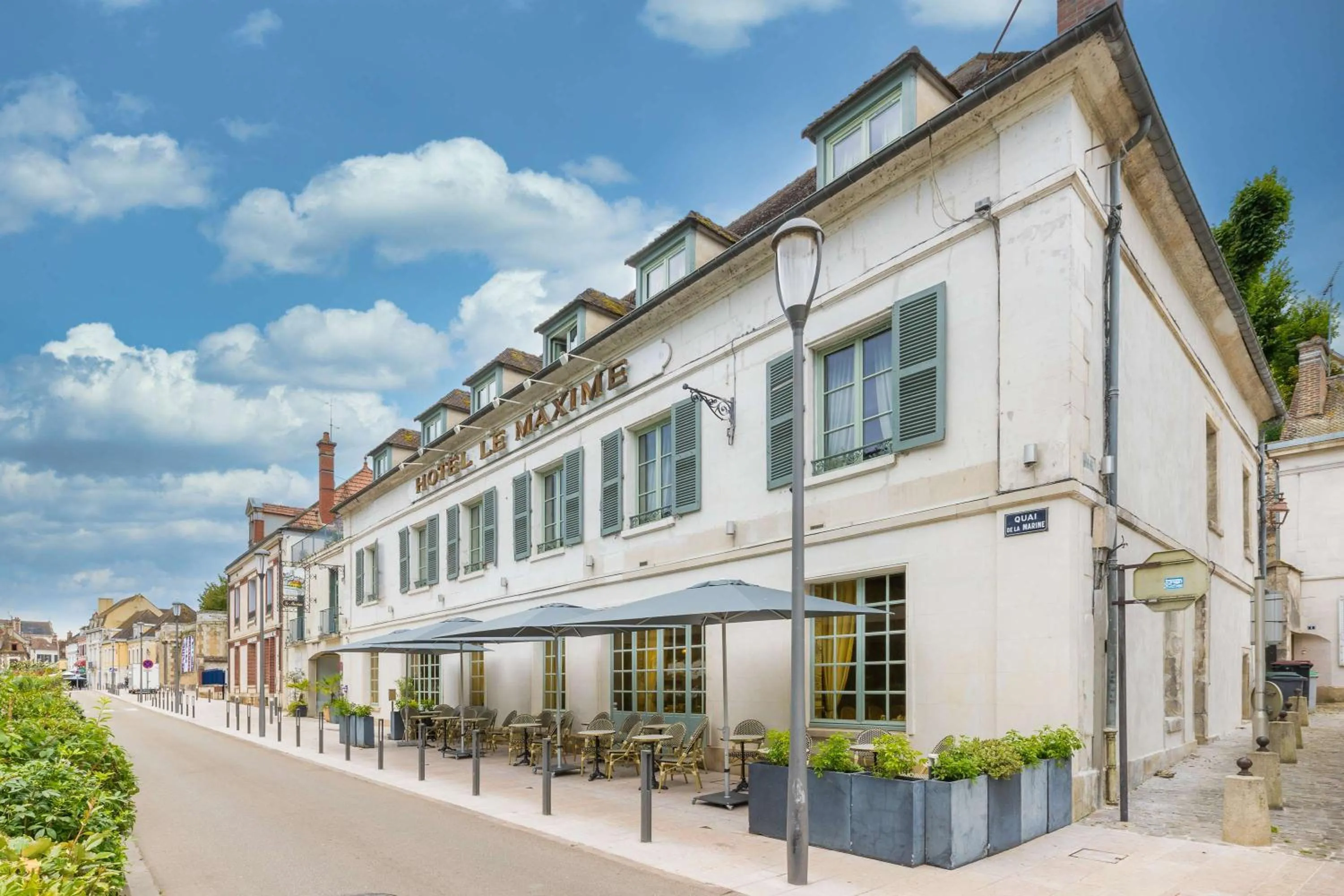 Property building in Hôtel Le Maxime - Best Western Signature Collection