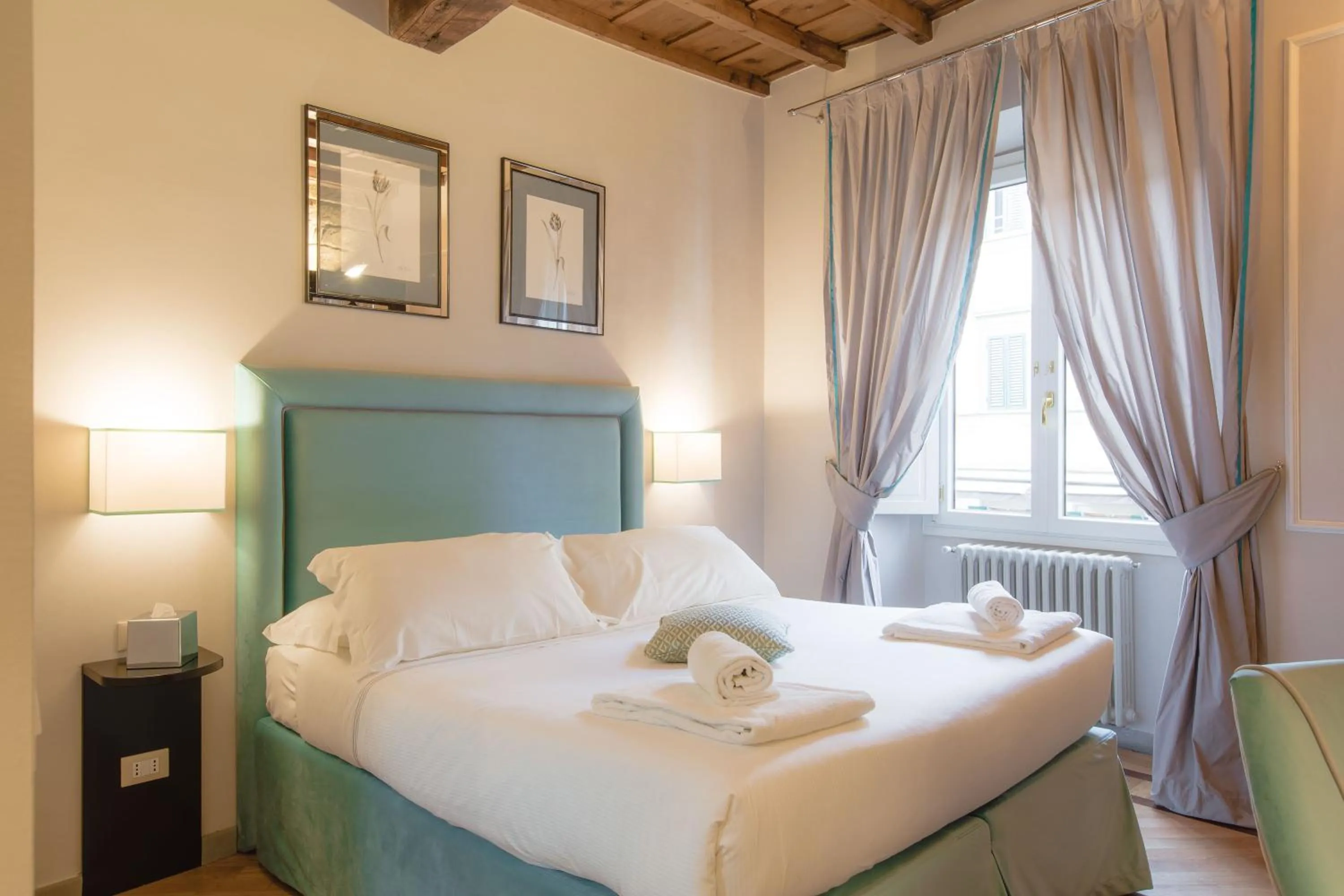 Bed in Relais Tosinghi