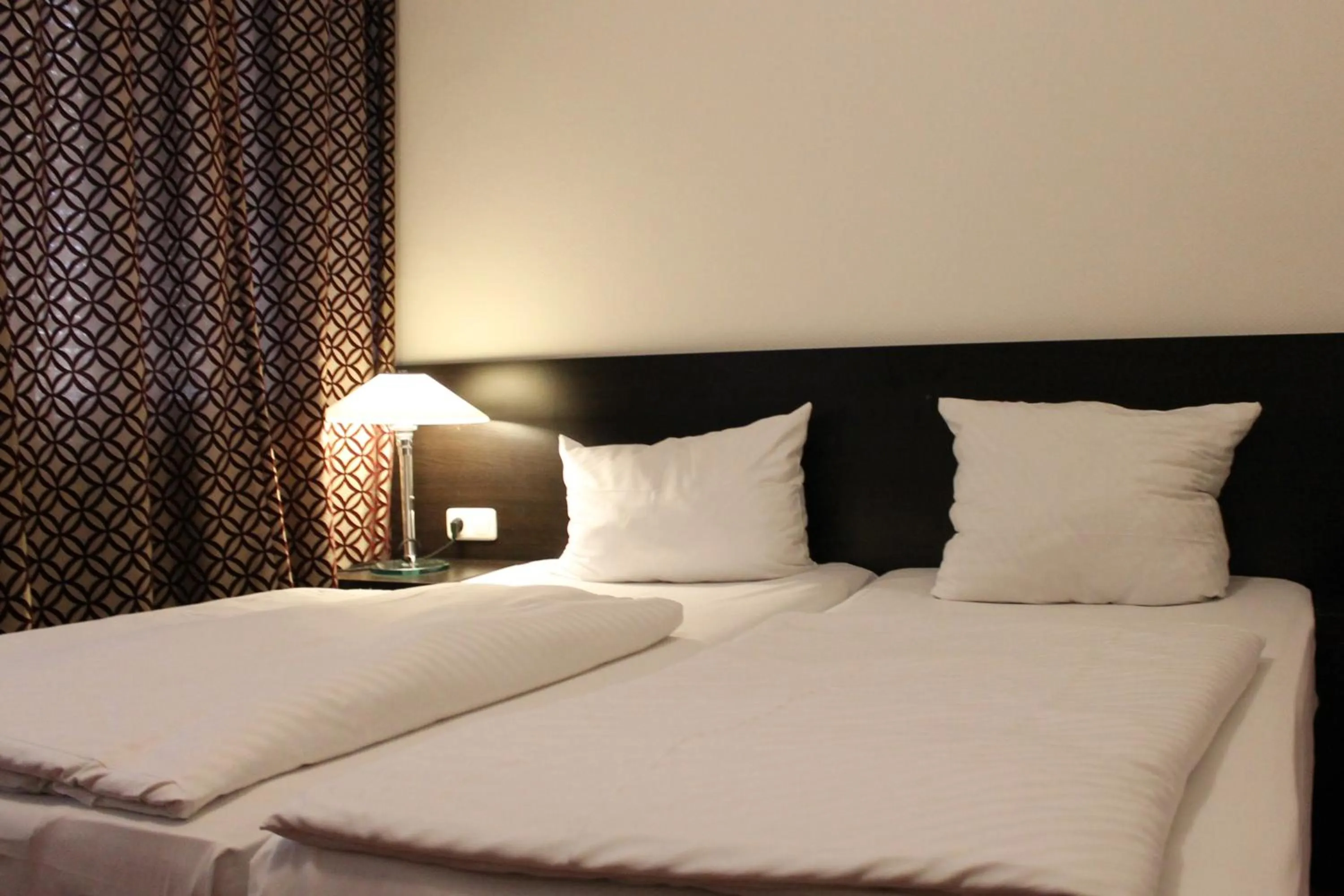 Bed in Aariana Hotel