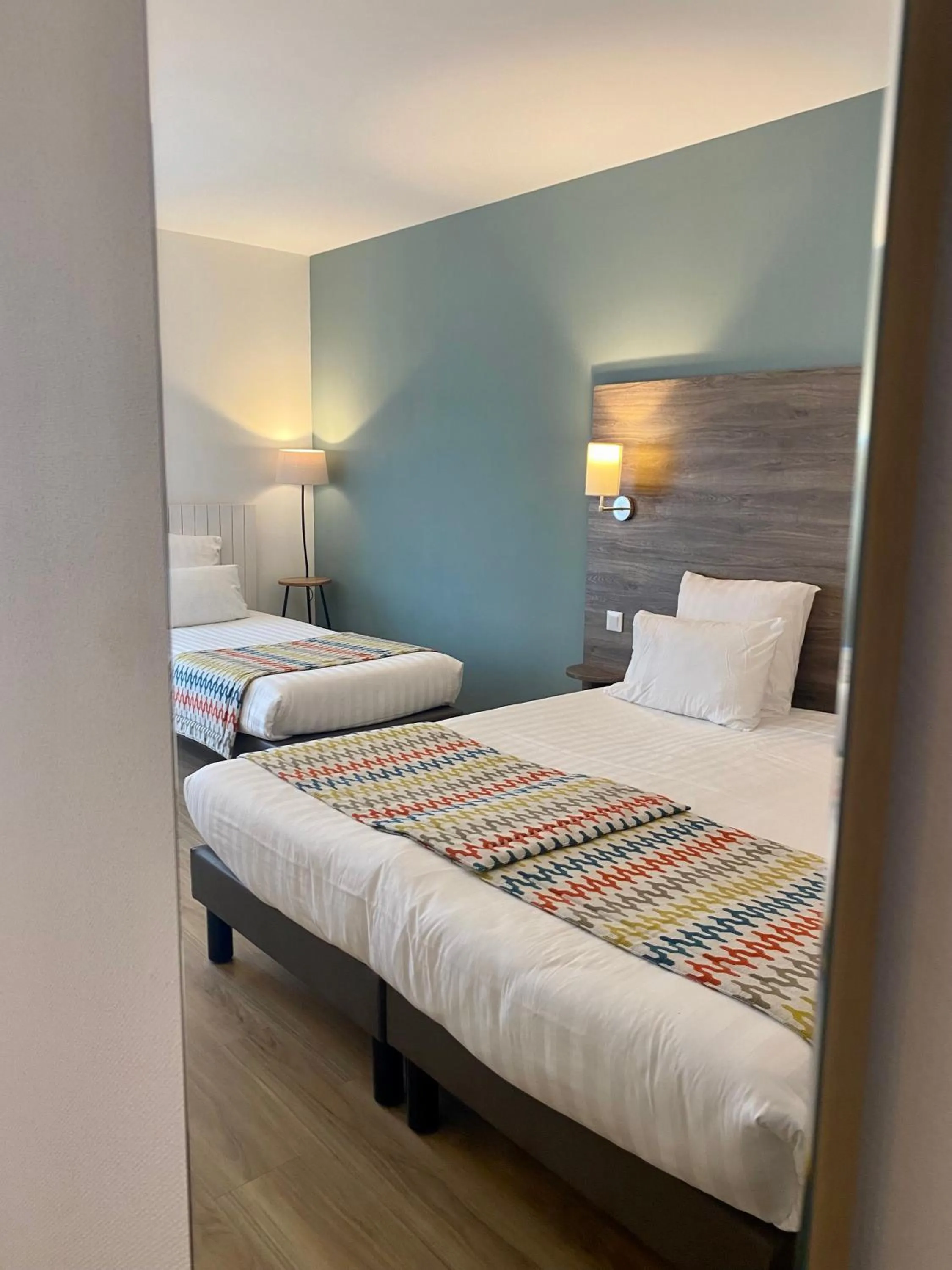 Bed in Hotel du Trégor