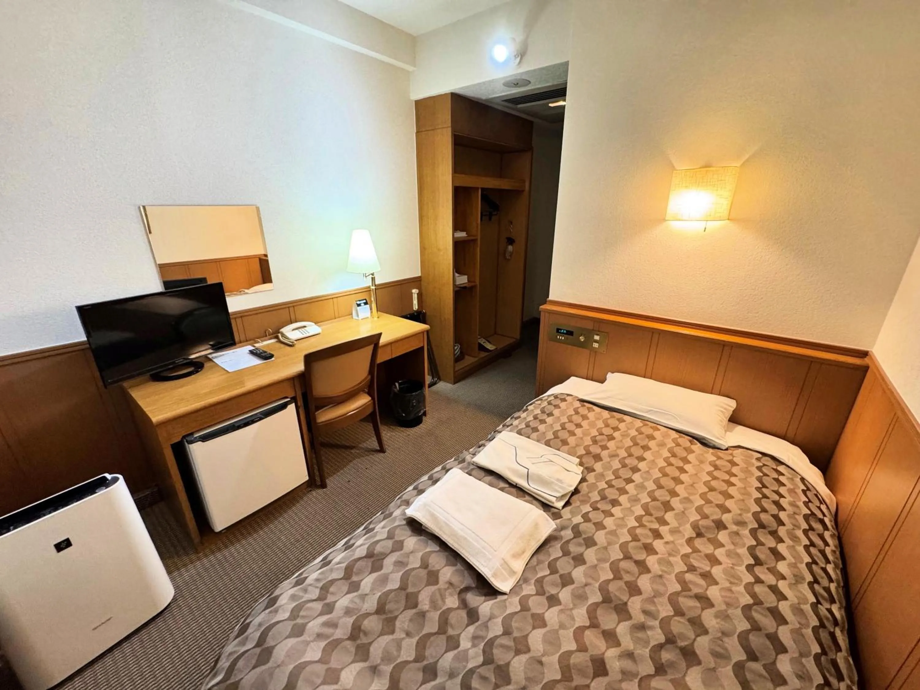 Bed in Ohta Grand Hotel