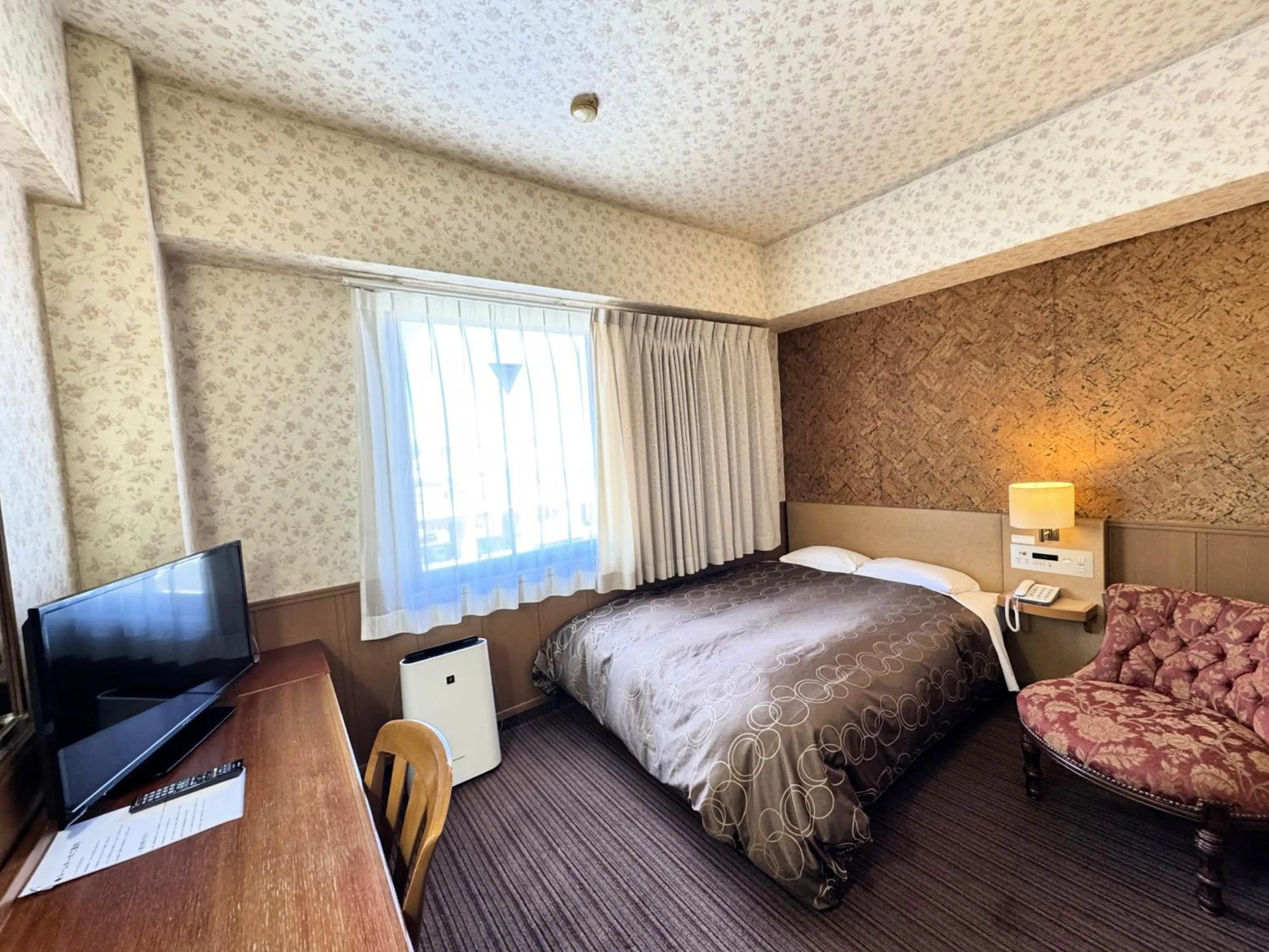 Bed in Ohta Grand Hotel