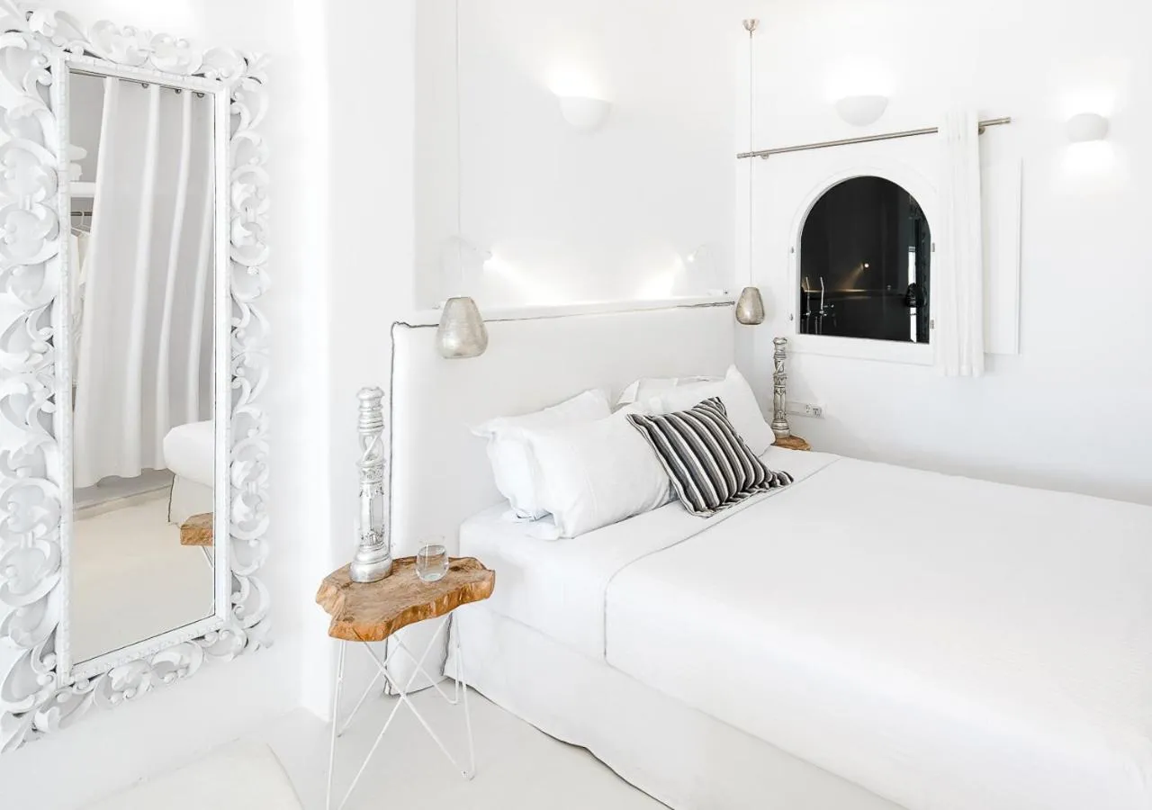 Bed in Dana Villas & Infinity Suites