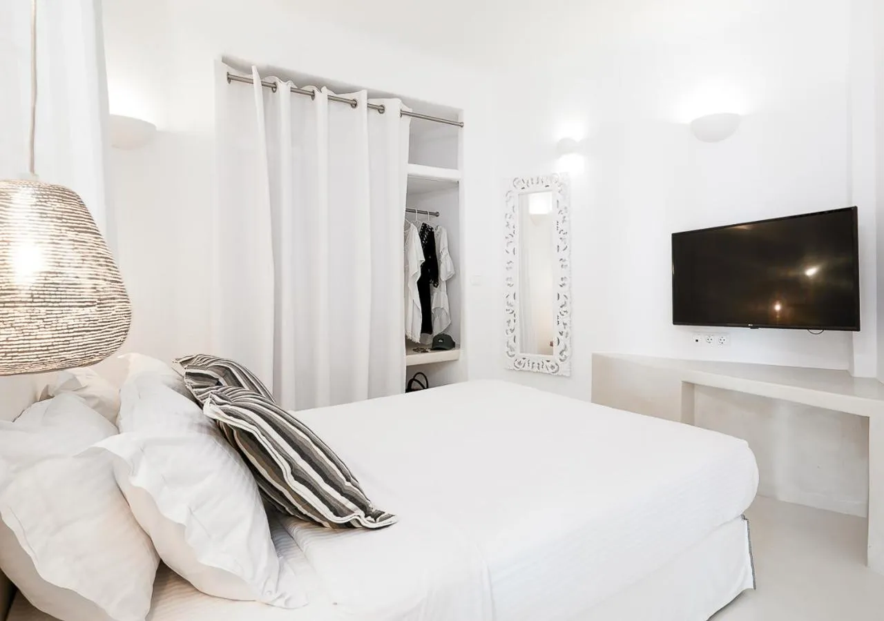 Bed in Dana Villas & Infinity Suites