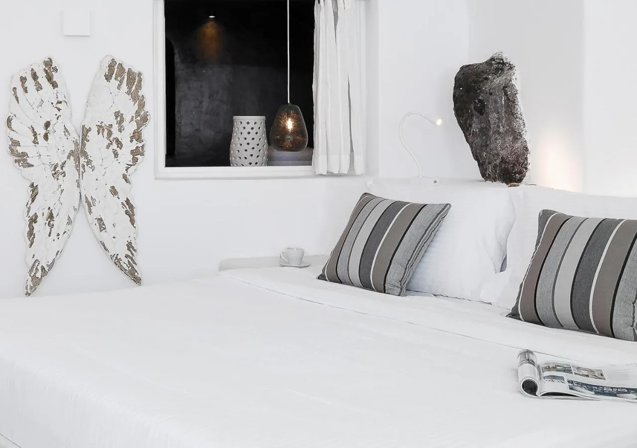 Bed in Dana Villas & Infinity Suites