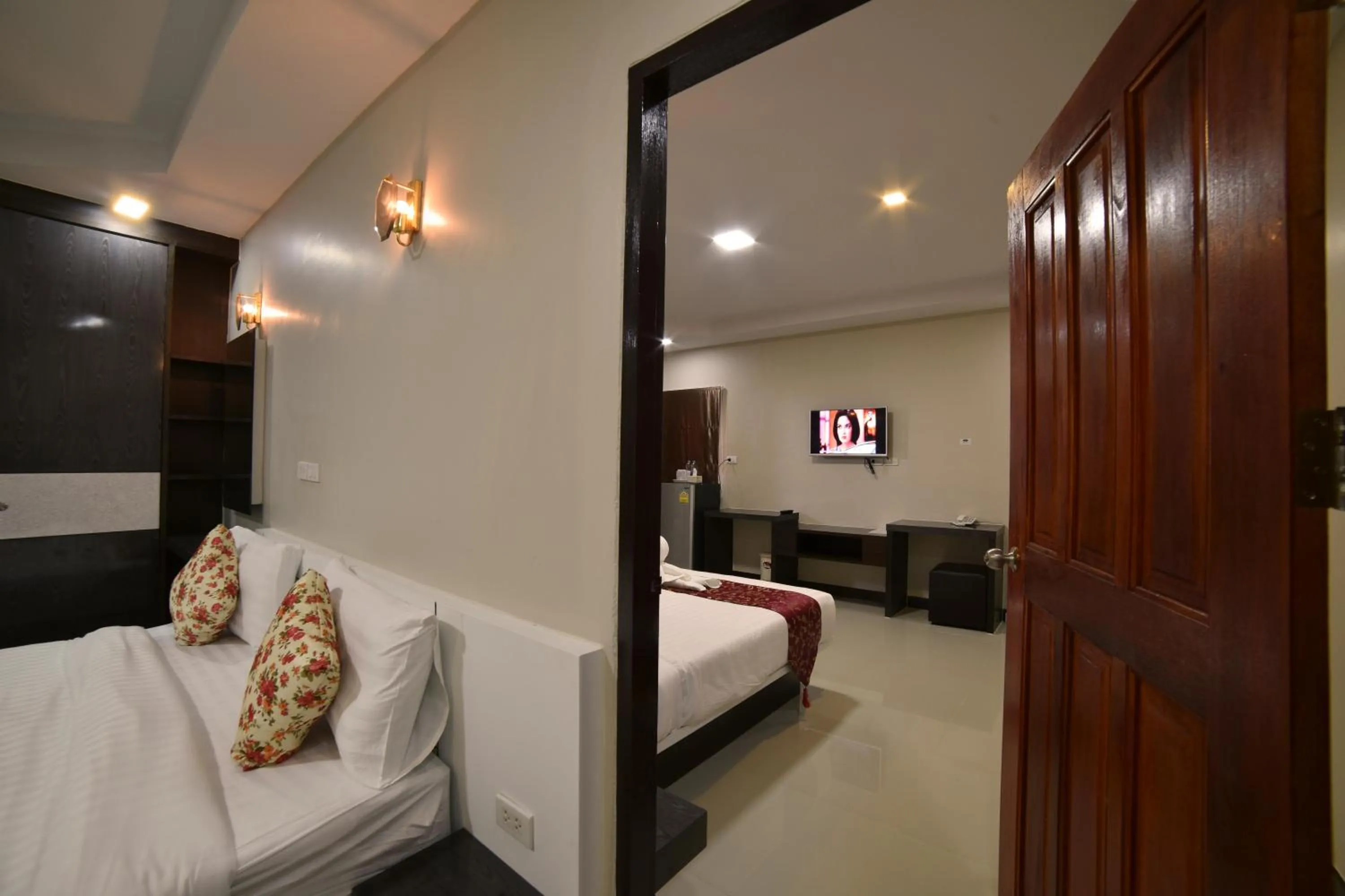 Bed in Gold Airport Suites