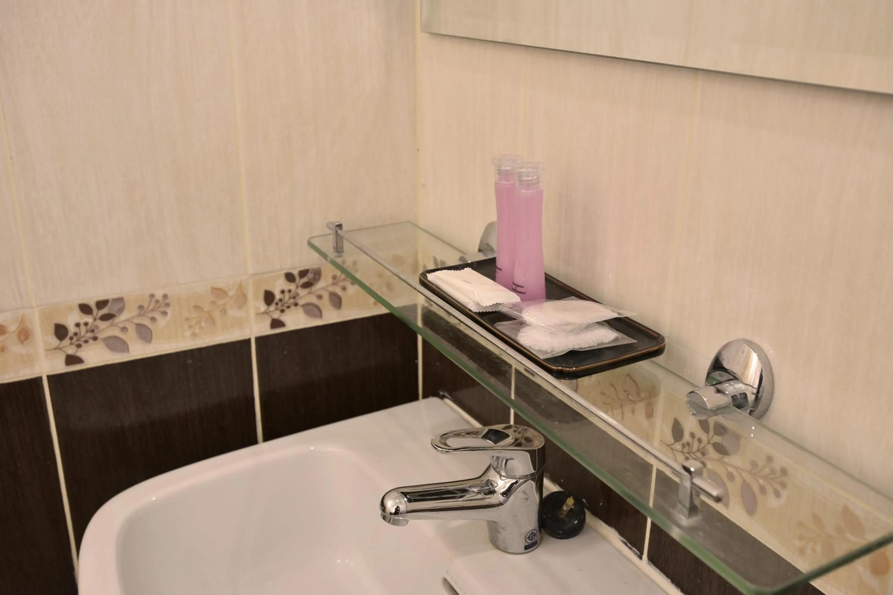 Bathroom in Gold Airport Suites