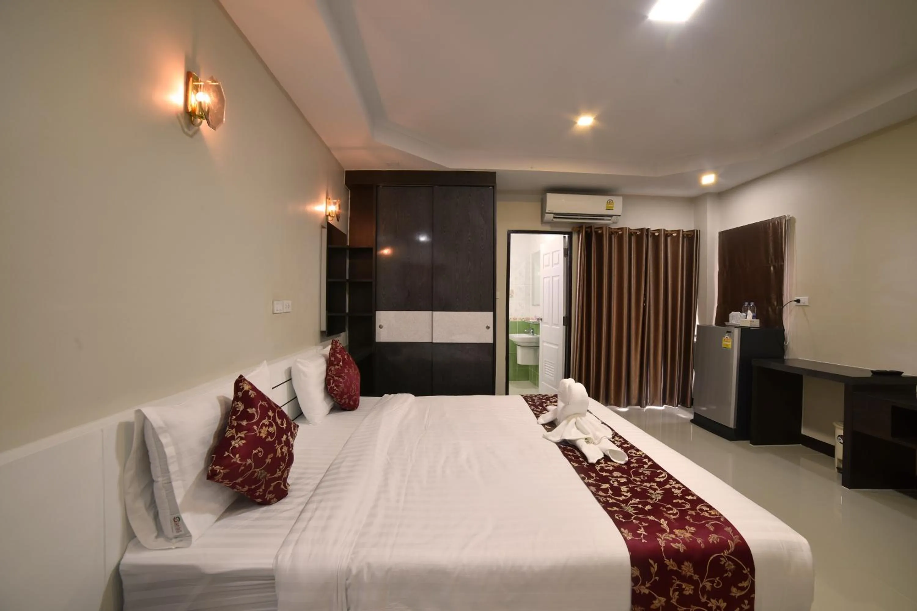 Bed in Gold Airport Suites