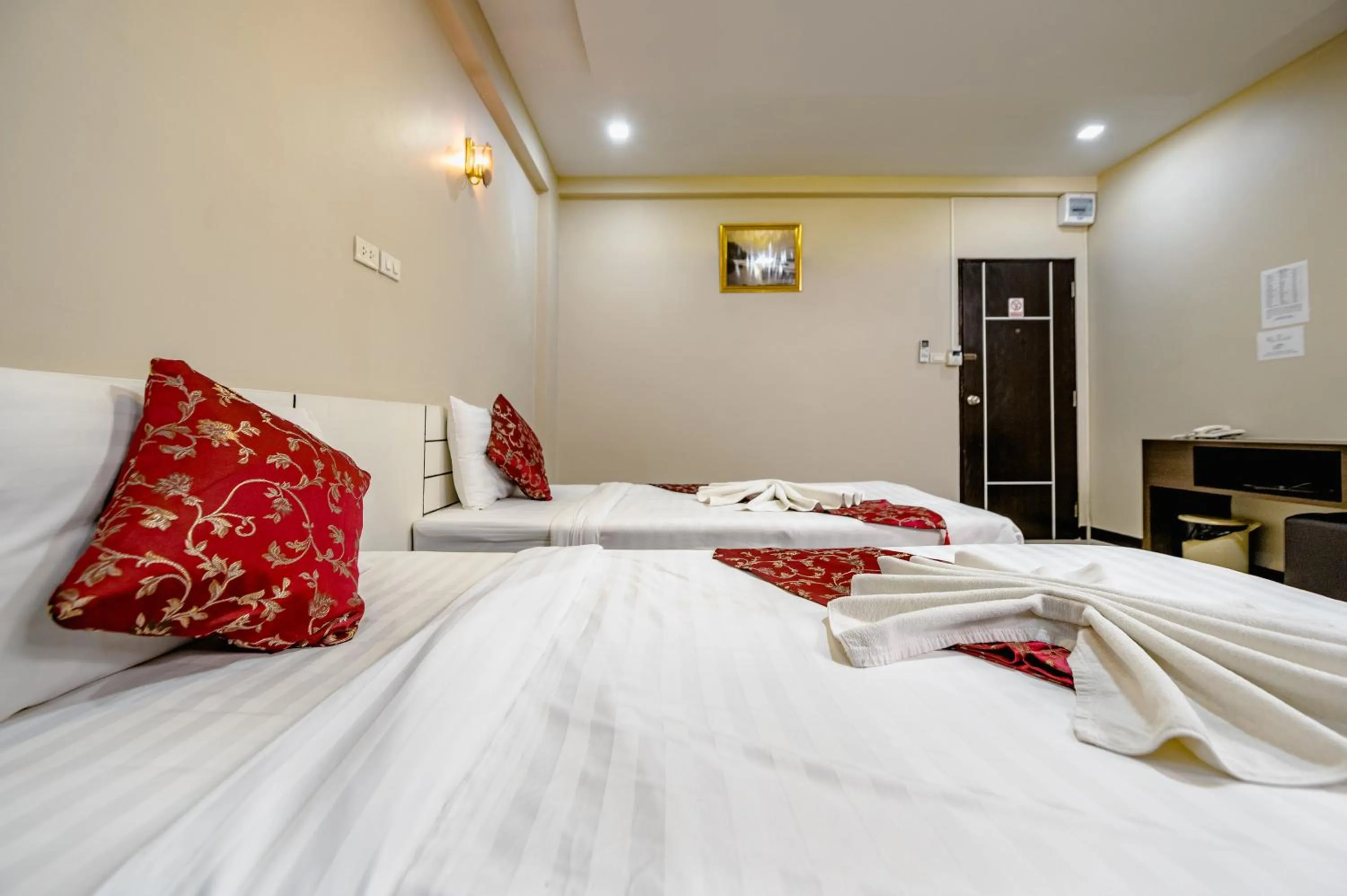 Bed in Gold Airport Suites