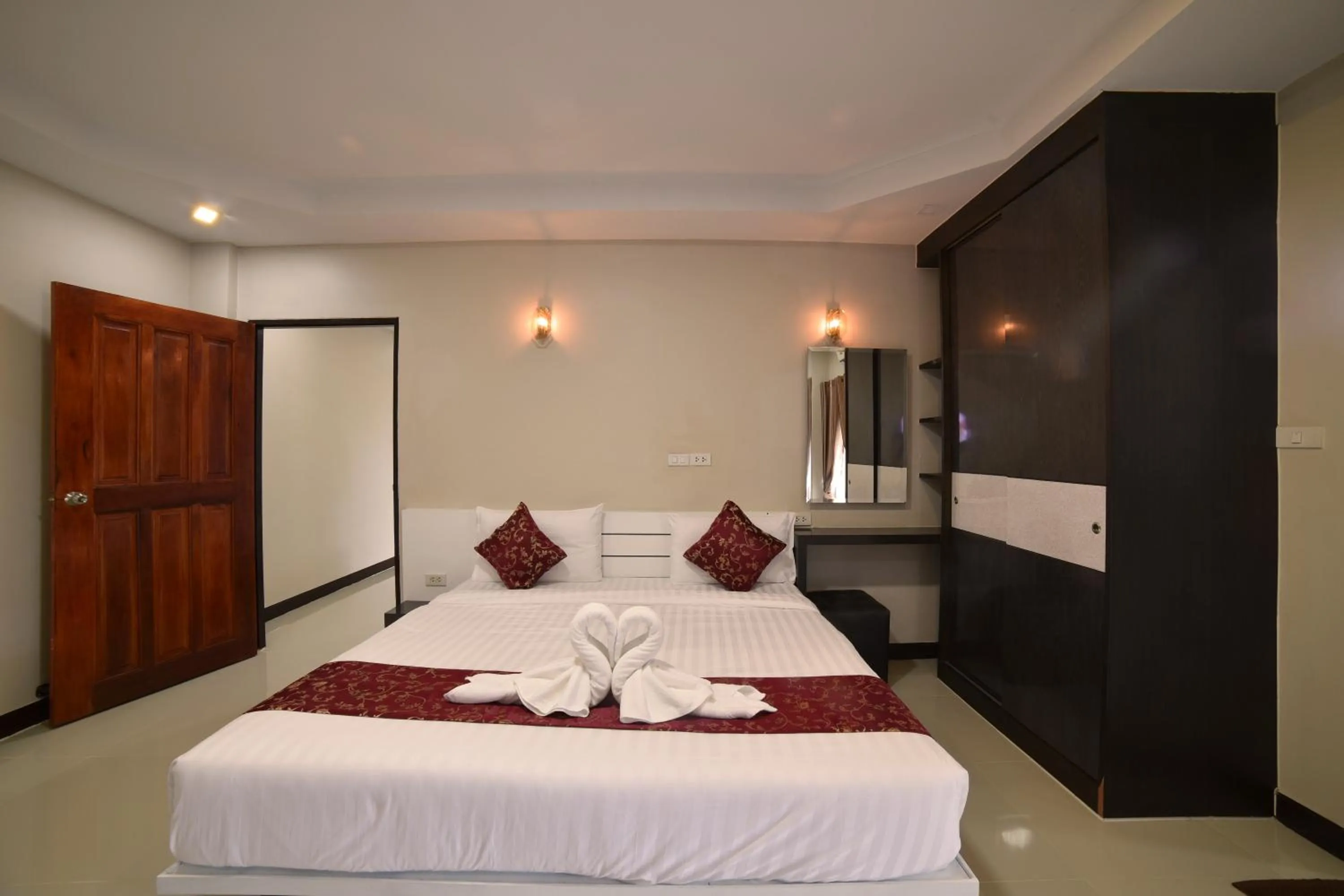 Bed in Gold Airport Suites