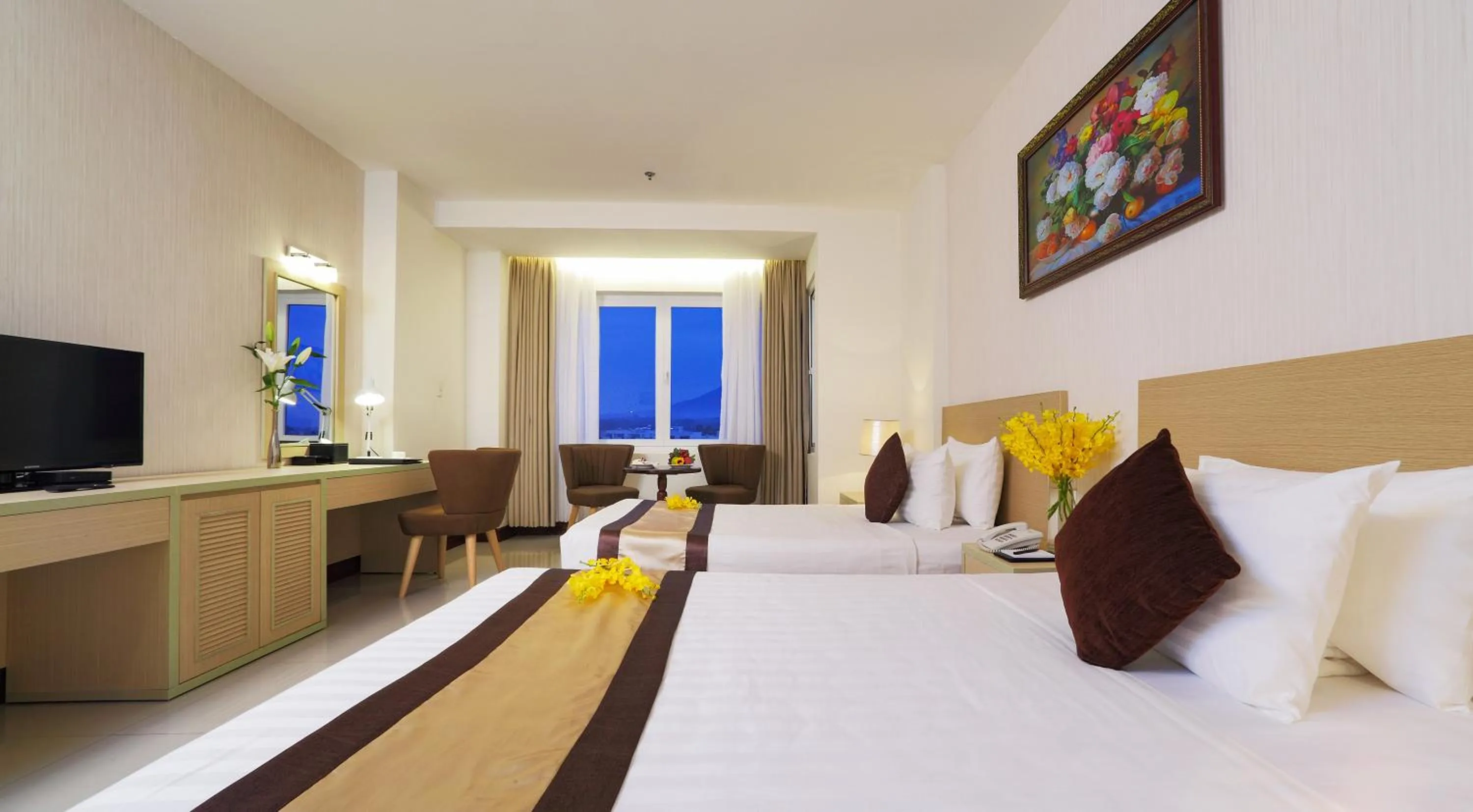 Bed in Sunrise Hotel