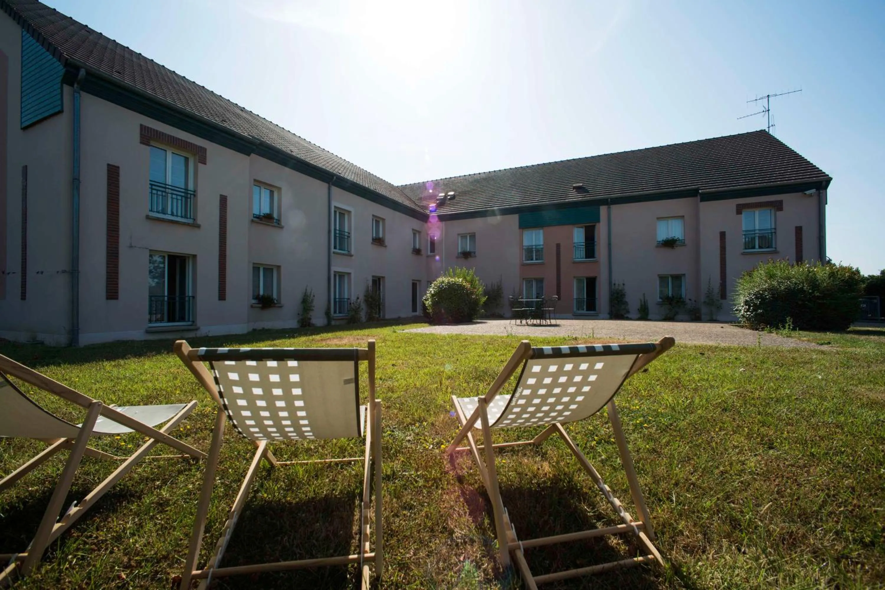 Property building in Brit Hotel Du Perche