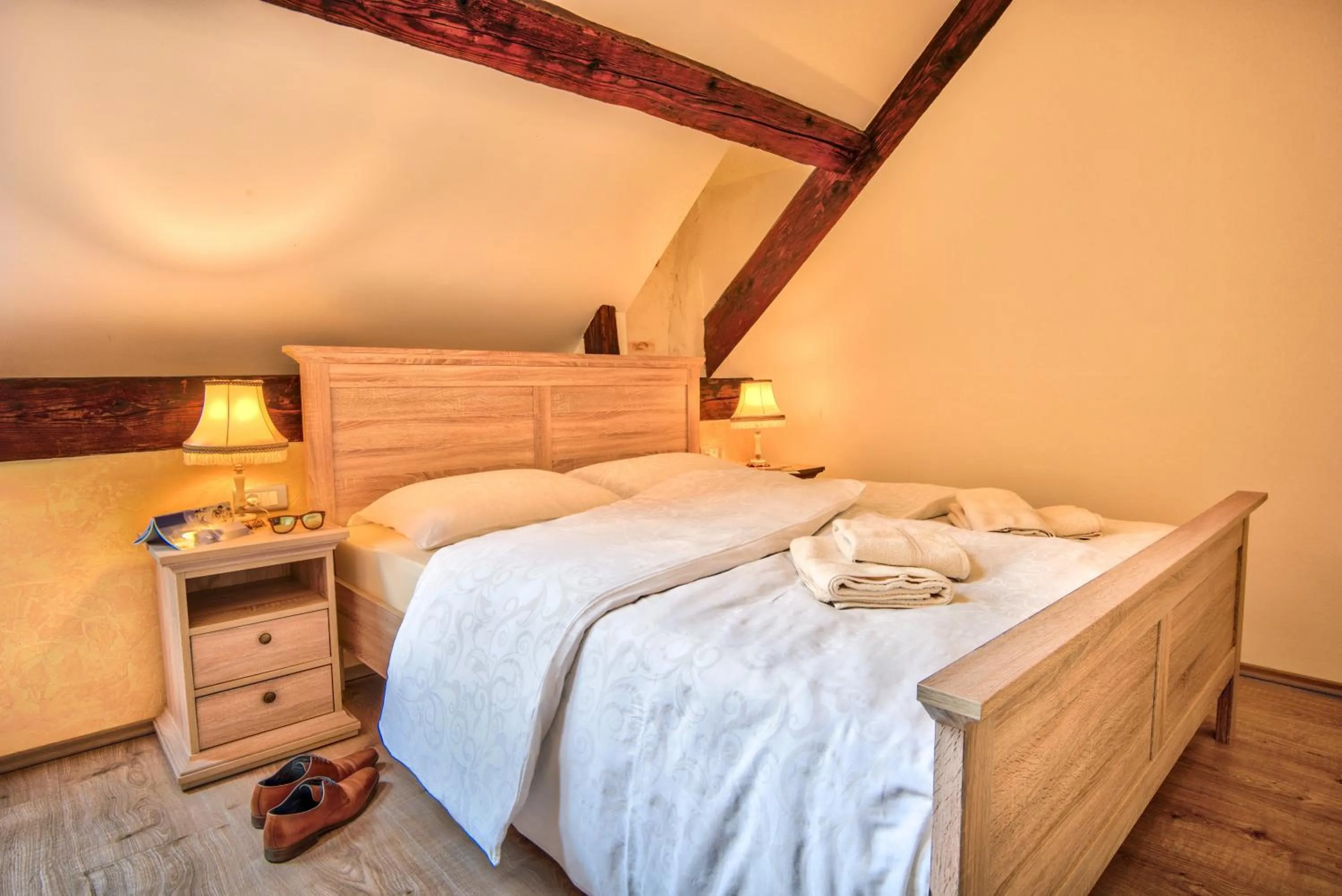 Photo of the whole room, Bed in Hiša Linhart, Hotel & Restaurant