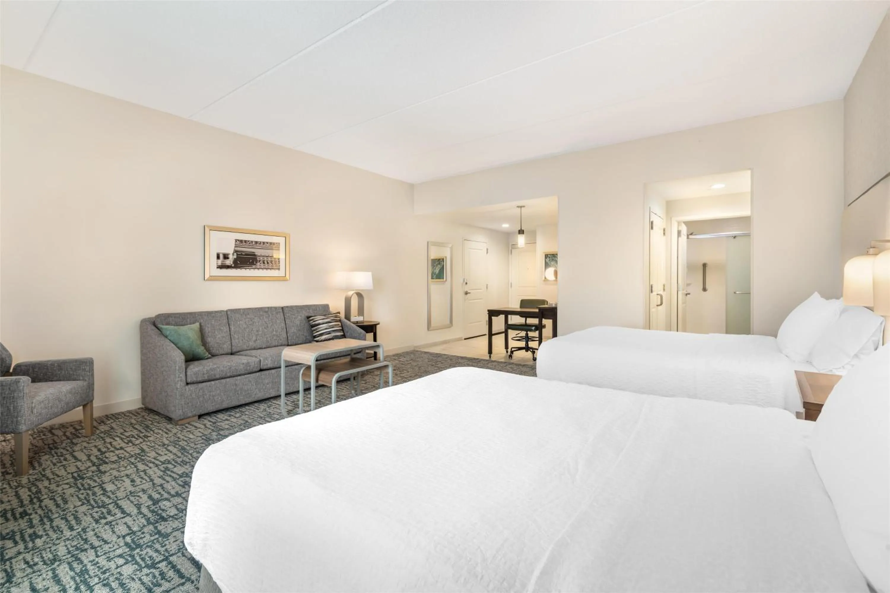 Living room, Bed in Homewood Suites By Hilton Schenectady