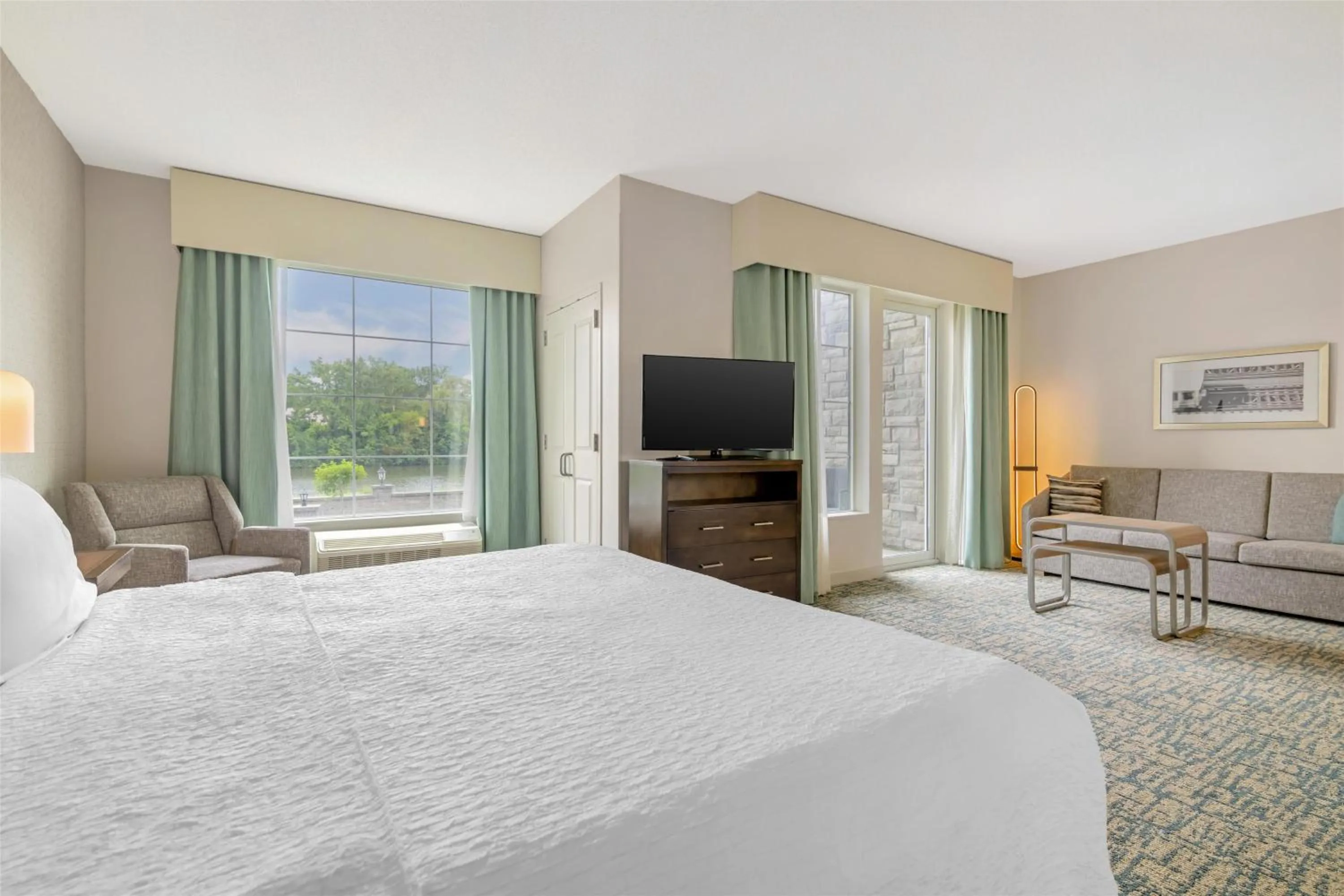 Living room, Bed in Homewood Suites By Hilton Schenectady