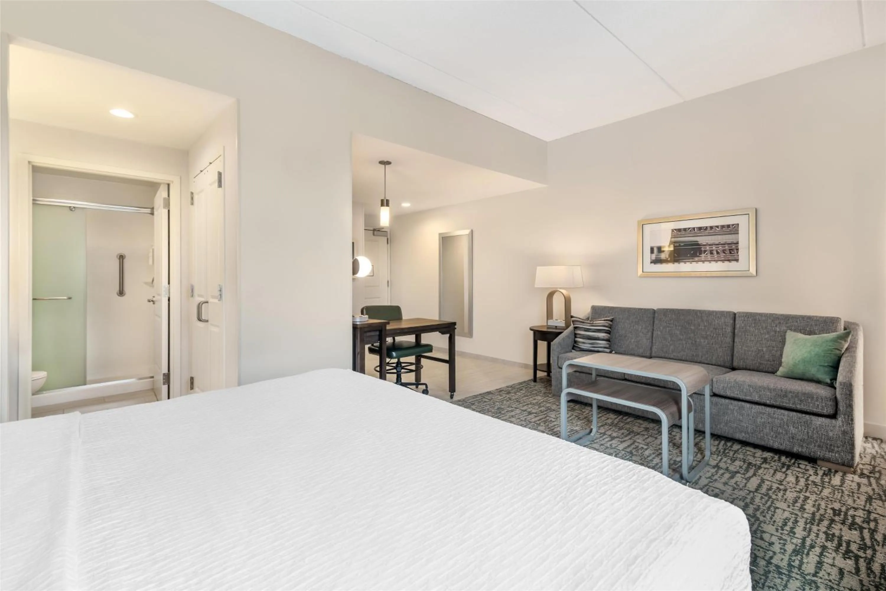 Living room, Bed in Homewood Suites By Hilton Schenectady