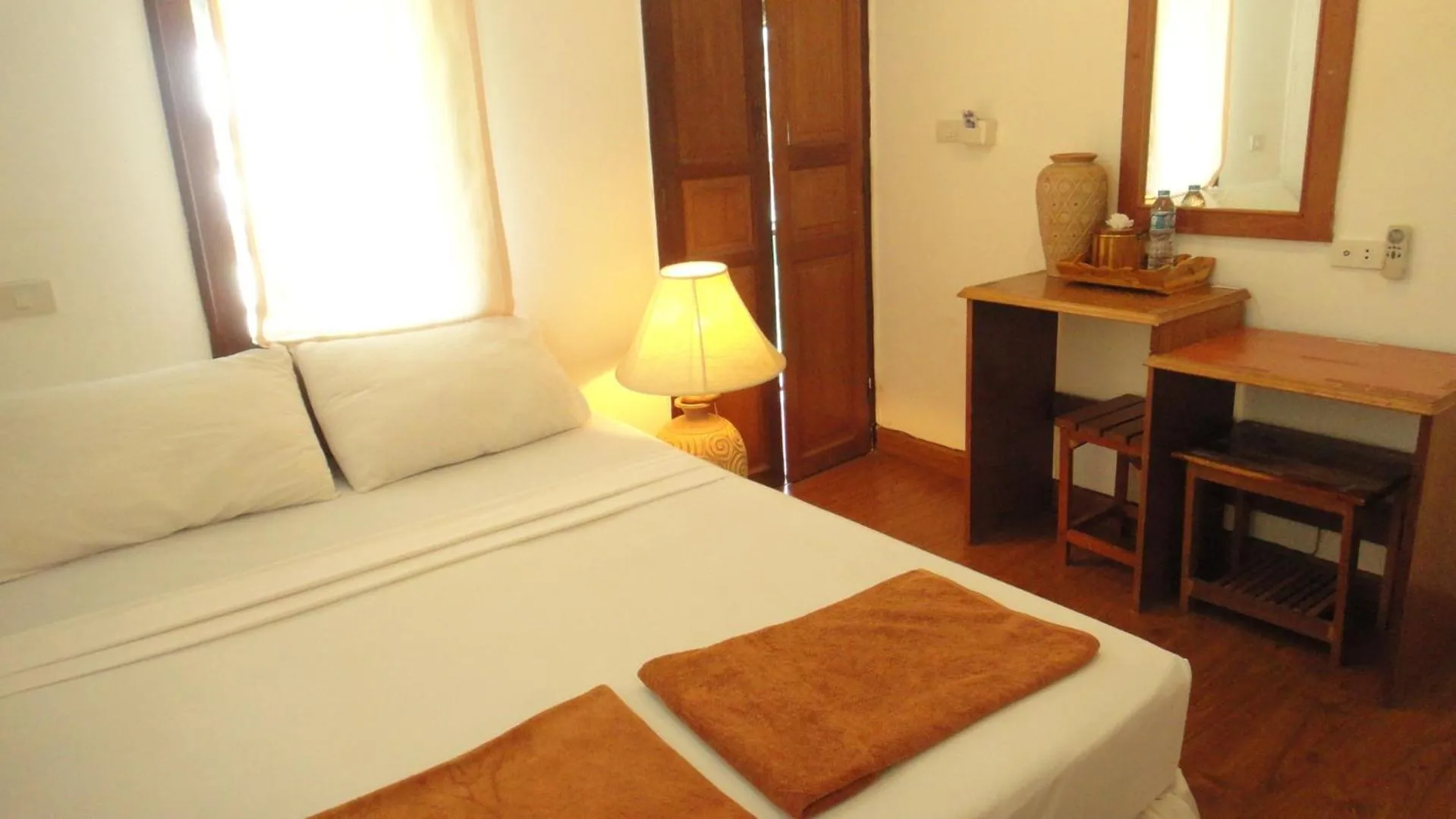 Bed in Tropical Garden Bungalow