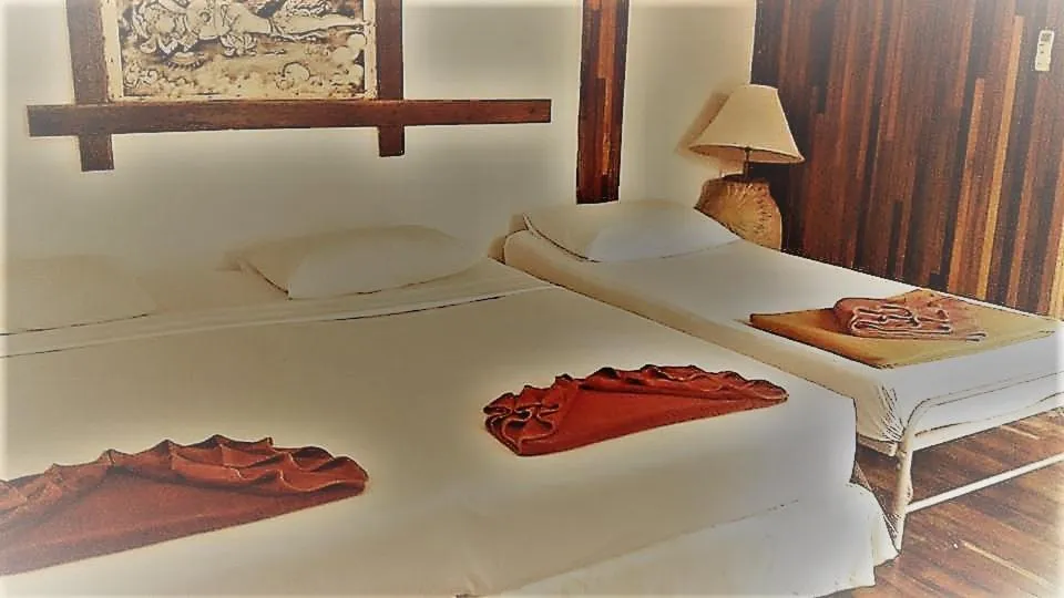 Bed in Tropical Garden Bungalow