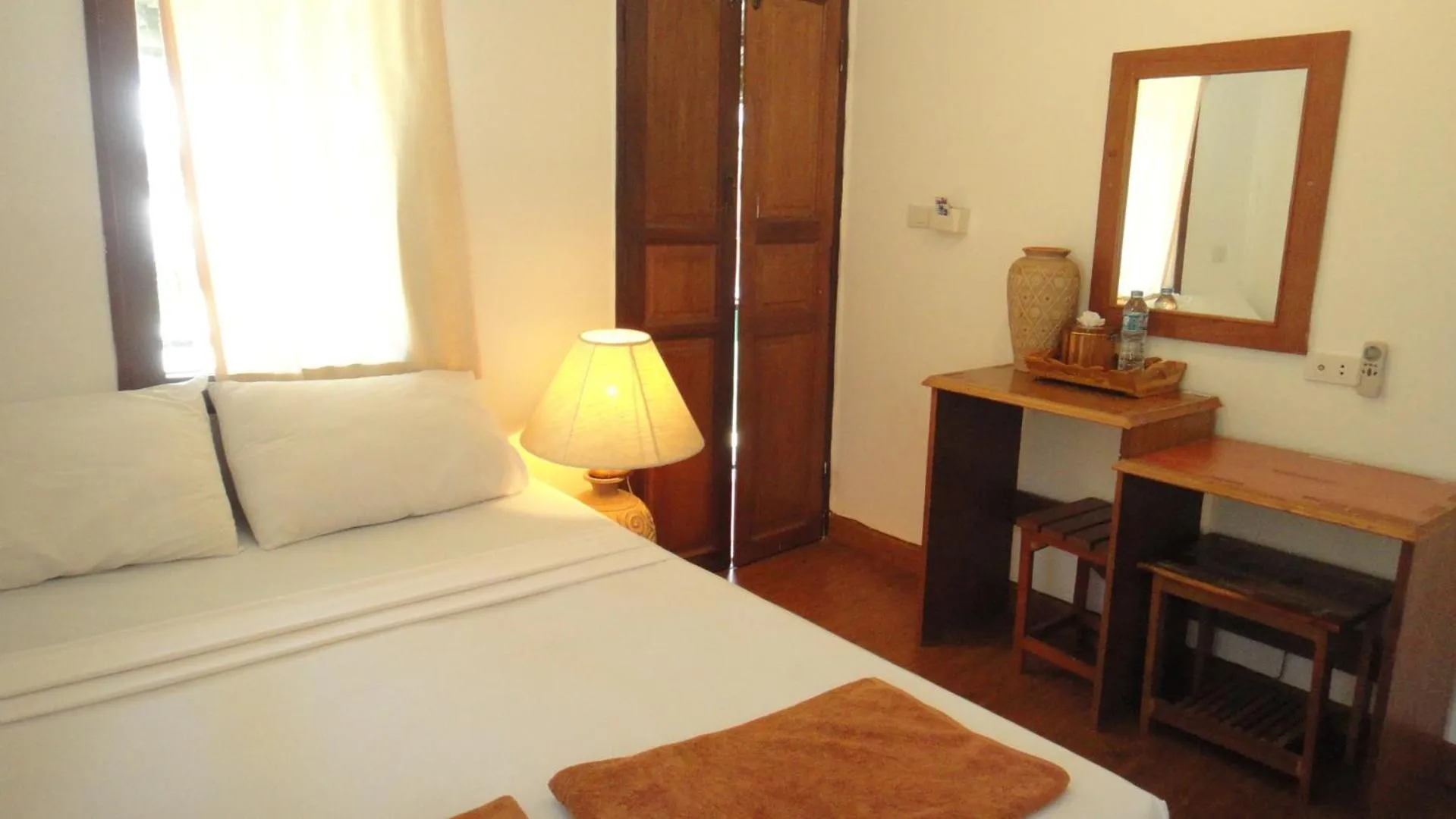 Bed in Tropical Garden Bungalow