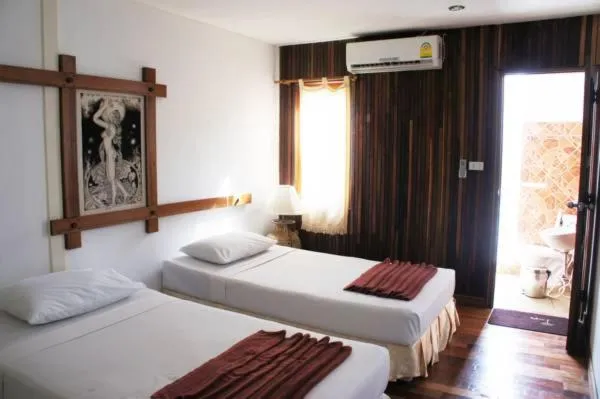 Bed in Tropical Garden Bungalow