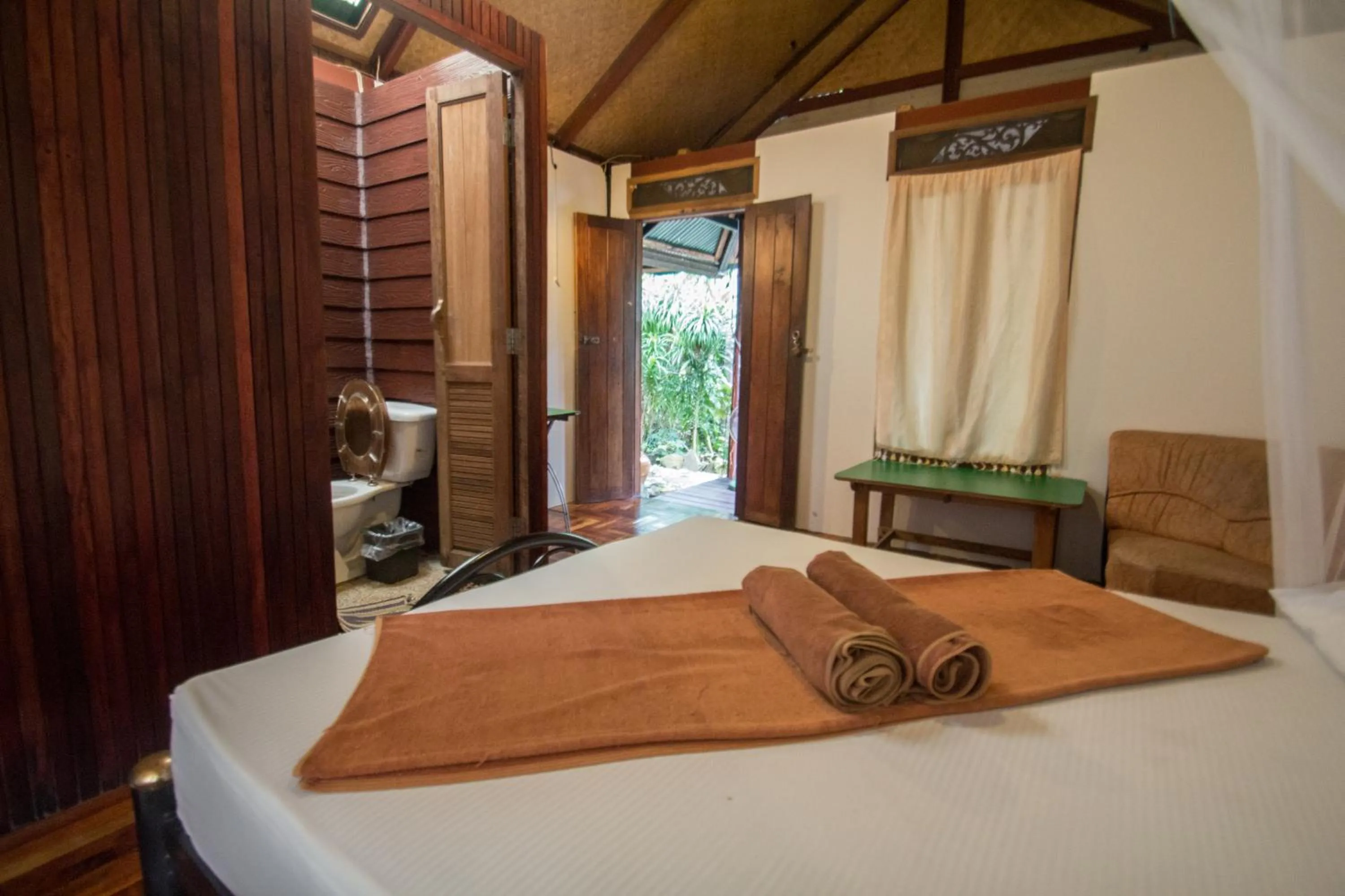 Bed in Tropical Garden Bungalow