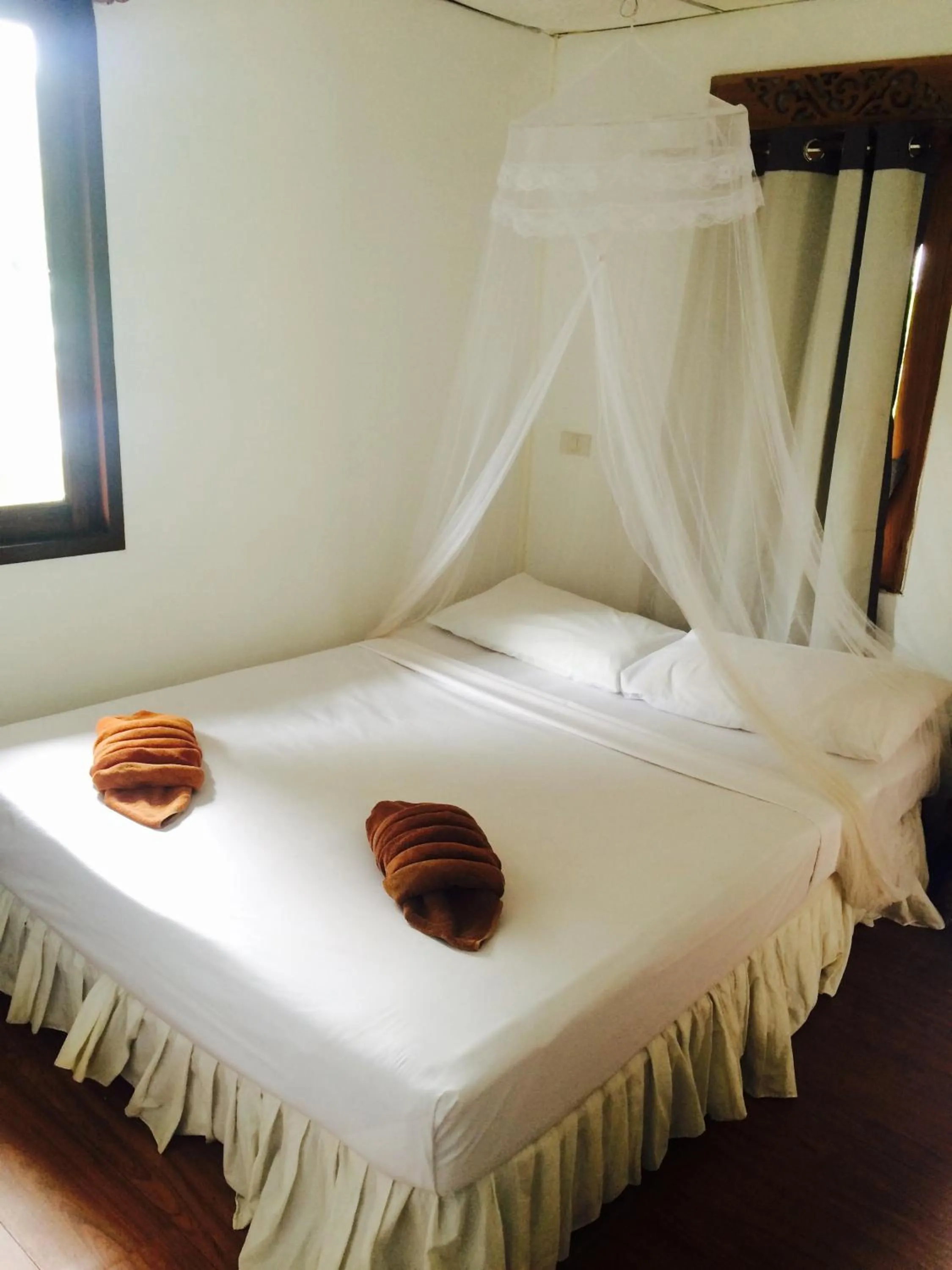 Bed in Tropical Garden Bungalow