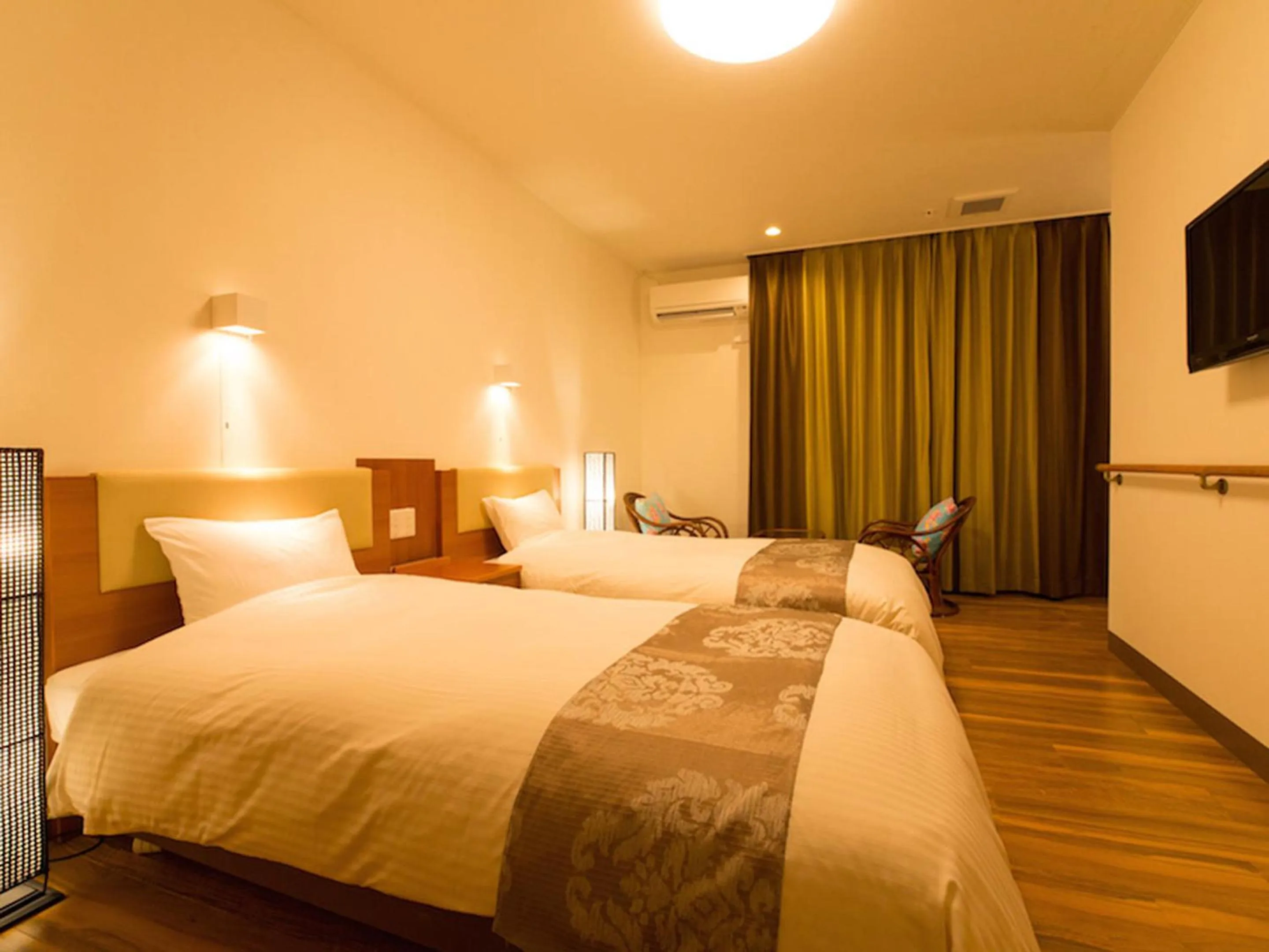 Photo of the whole room, Bed in Sun Green Resort Hotel Ishigaki