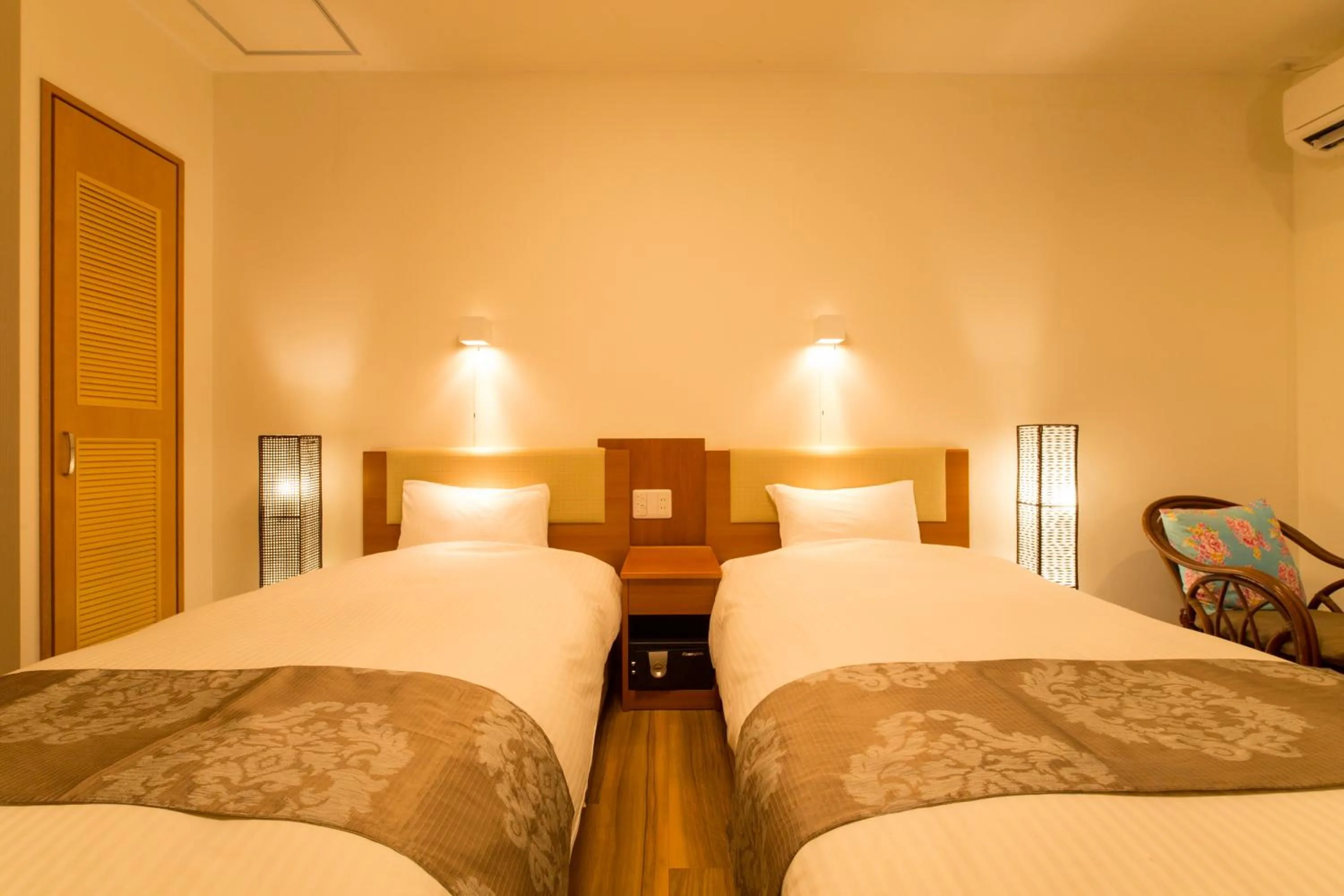 Photo of the whole room, Bed in Sun Green Resort Hotel Ishigaki