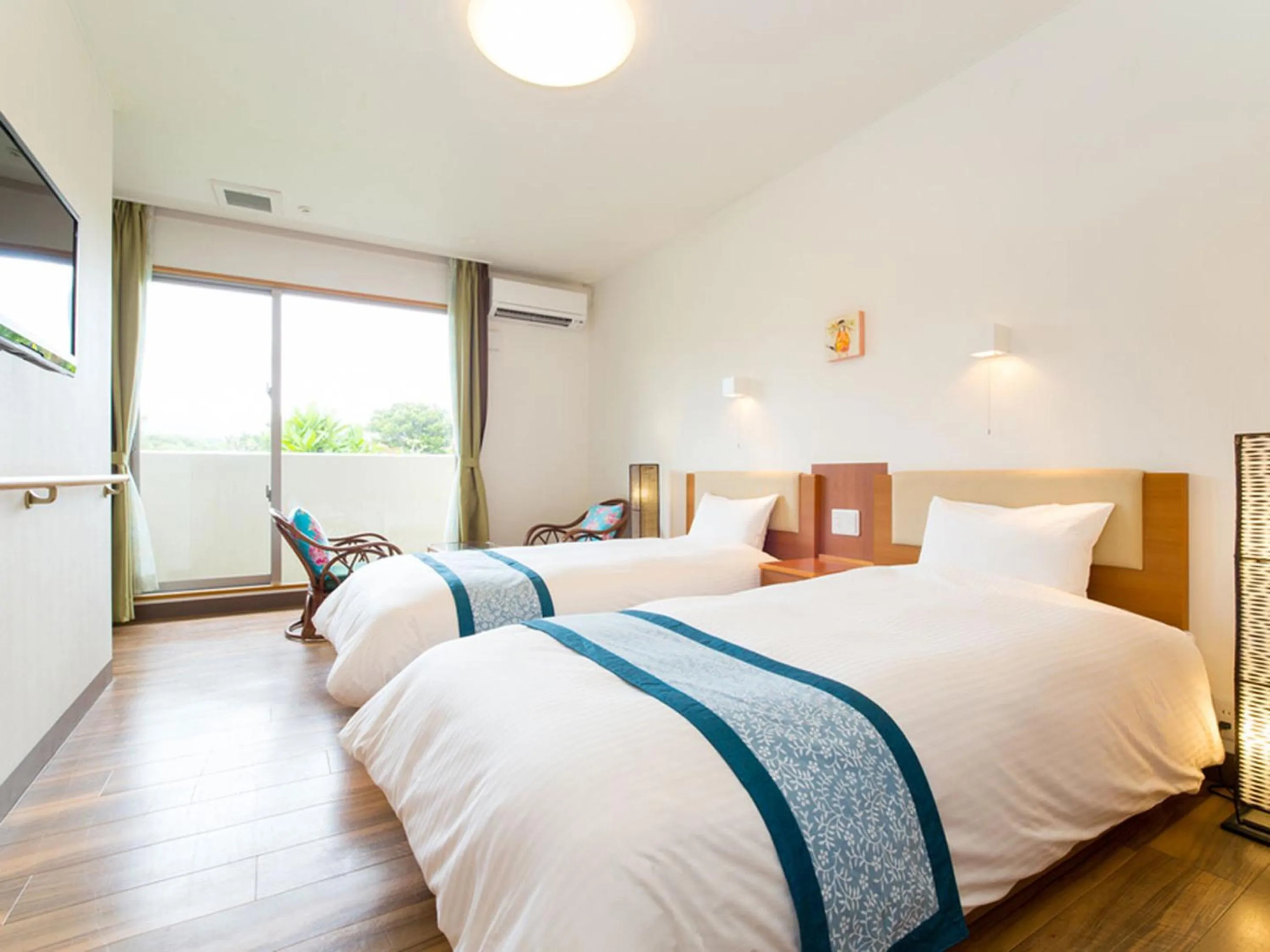 Photo of the whole room, Bed in Sun Green Resort Hotel Ishigaki